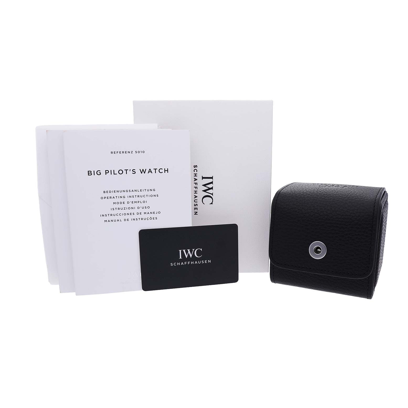 The image shows accessories for the IWC Pilot IW510301 Men's Titanium Black Dial model, including manuals, a guarantee card, and a black travel pouch.