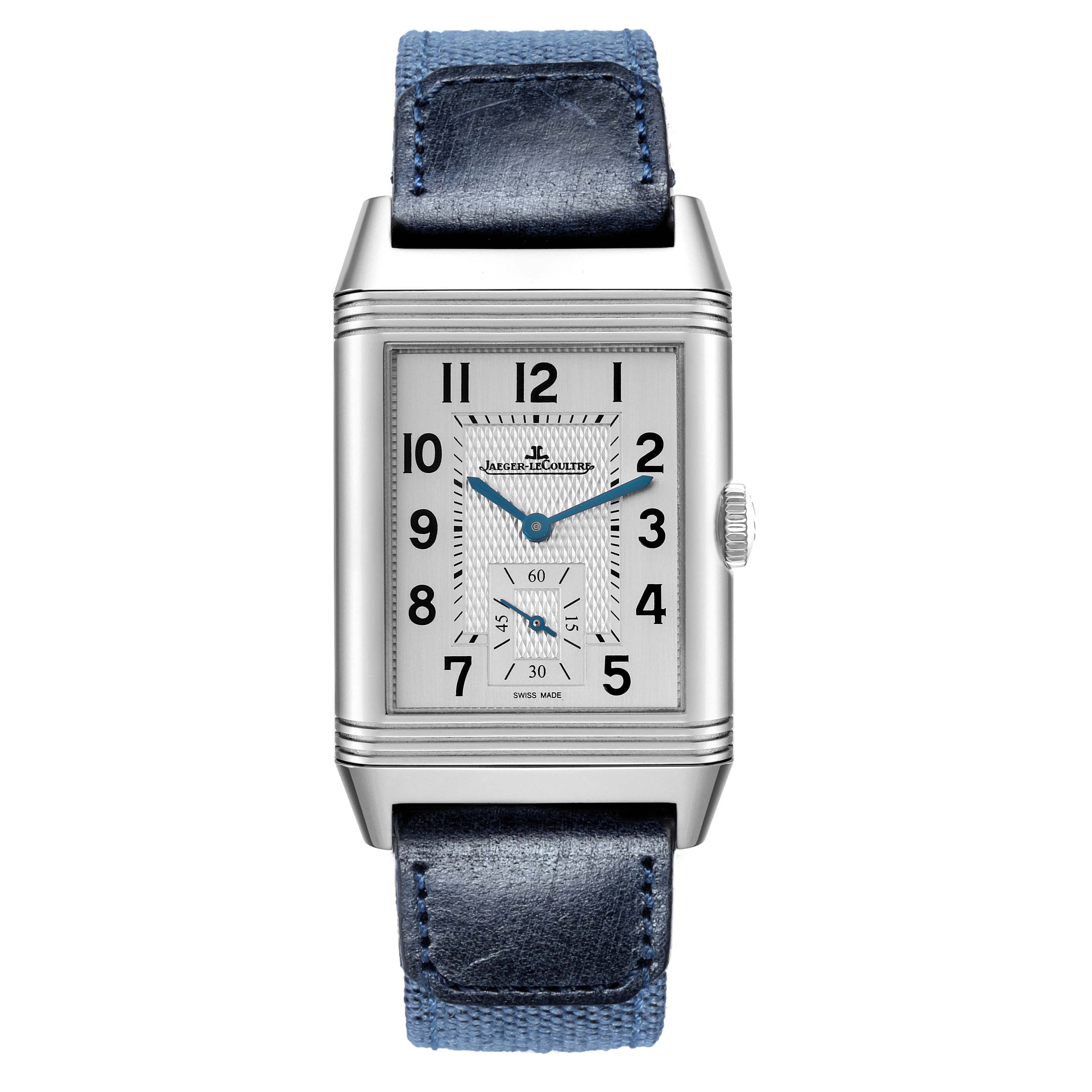 The Jaeger LeCoultre Reverso Q3848422 Men
s Stainless Steel Silver Dial watch is shown from a front view, displaying its rectangular face, dial, and blue leather strap.