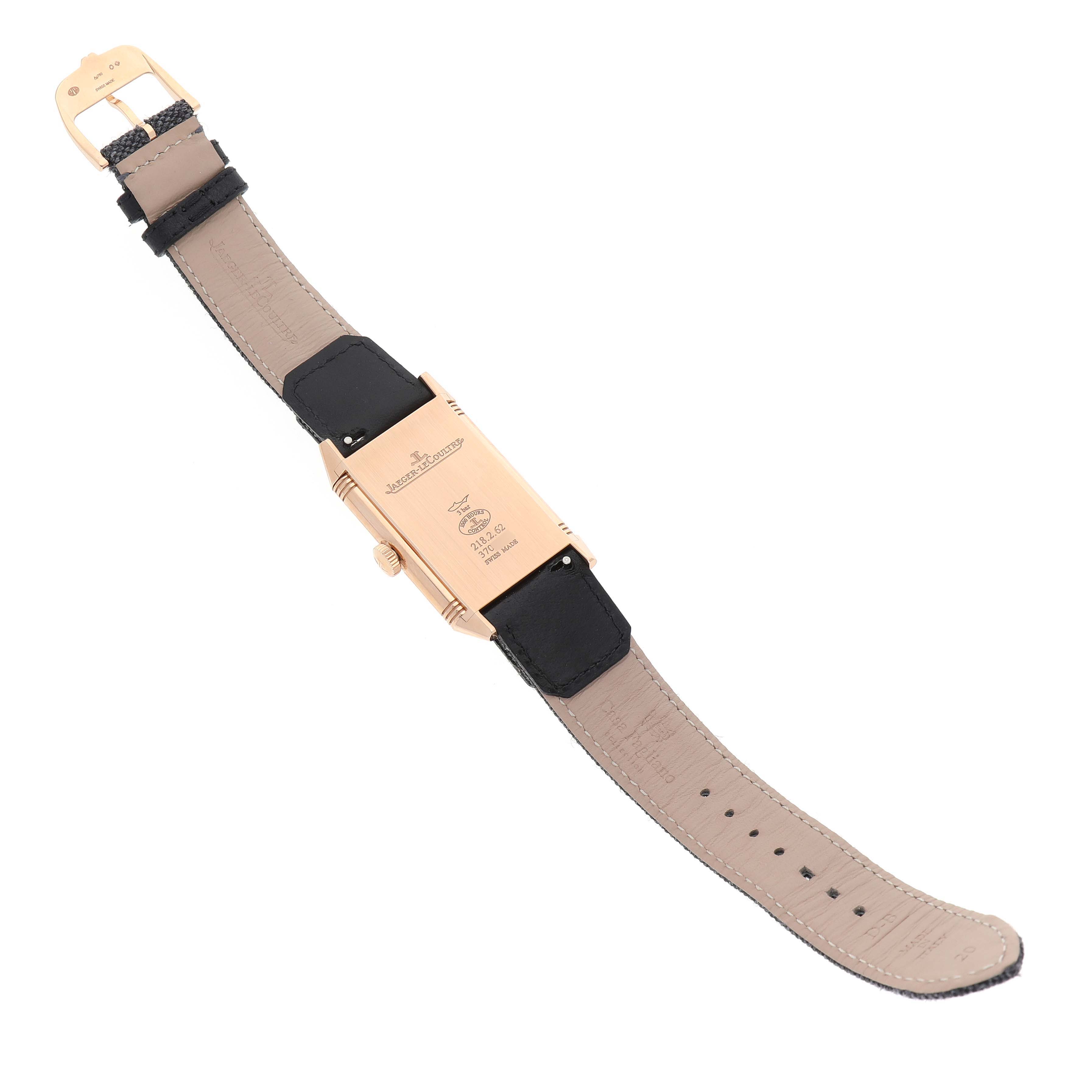 The image shows the reverse side of the Jaeger LeCoultre Reverso Q7132521 Men's Rose Gold Silver Dial watch, highlighting the back case and straps.