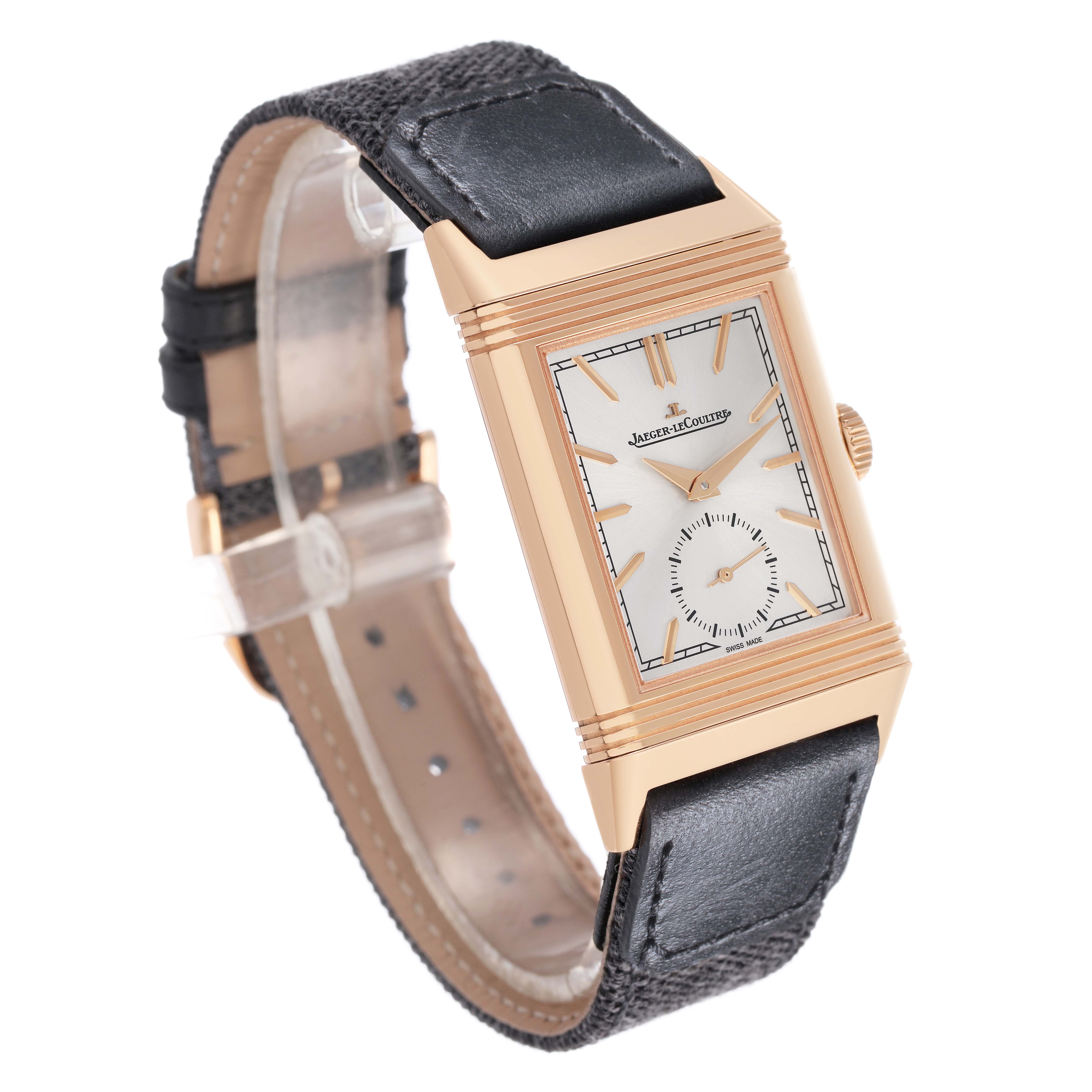 The Jaeger LeCoultre Reverso Q7132521 Men's Rose Gold Silver Dial watch is shown at a three-quarter angle, highlighting the dial, bezel, and leather strap.