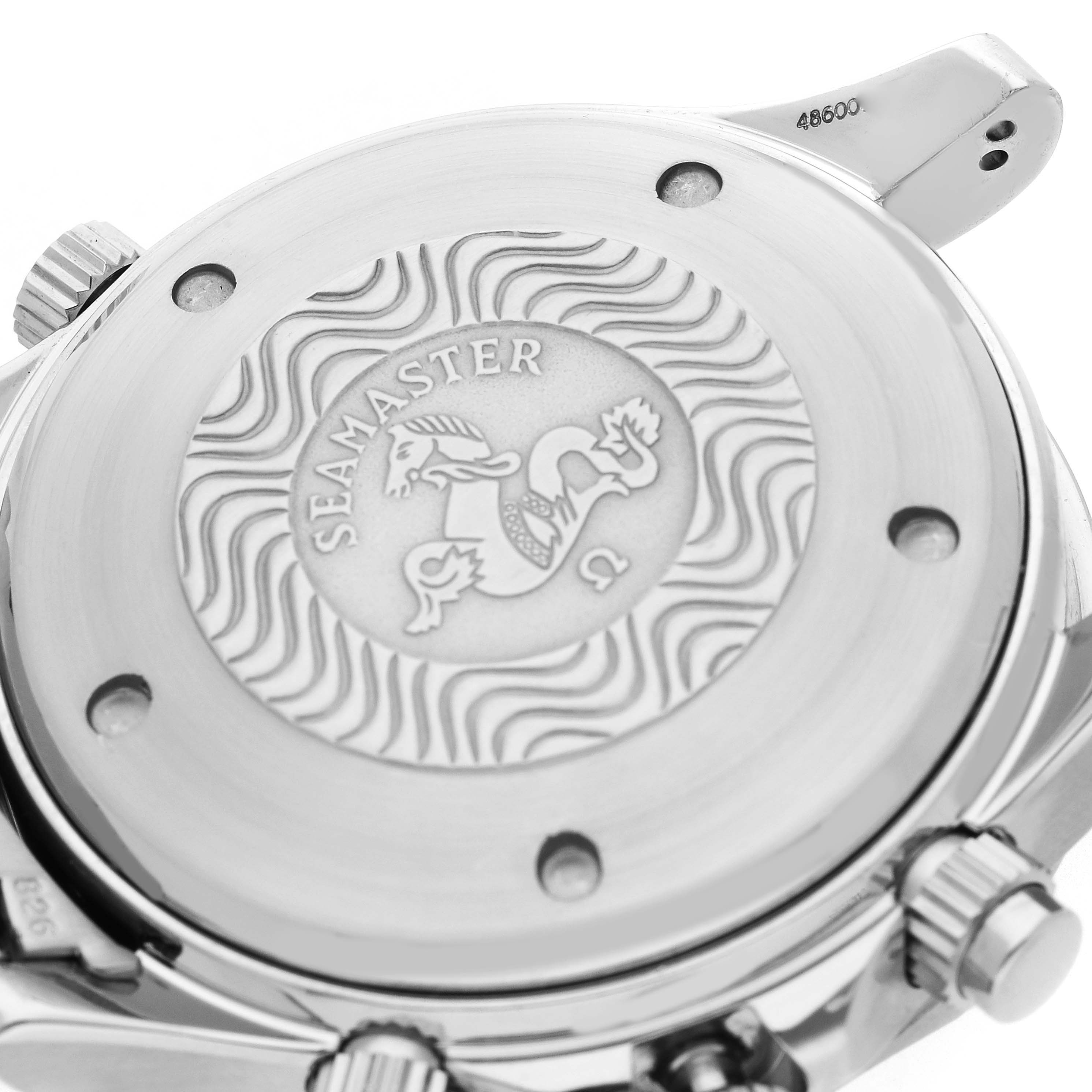 The image shows the case back of an Omega Seamaster 2598.20.00 Men
s Stainless Steel White Dial, highlighting the engraved logo and wave pattern.