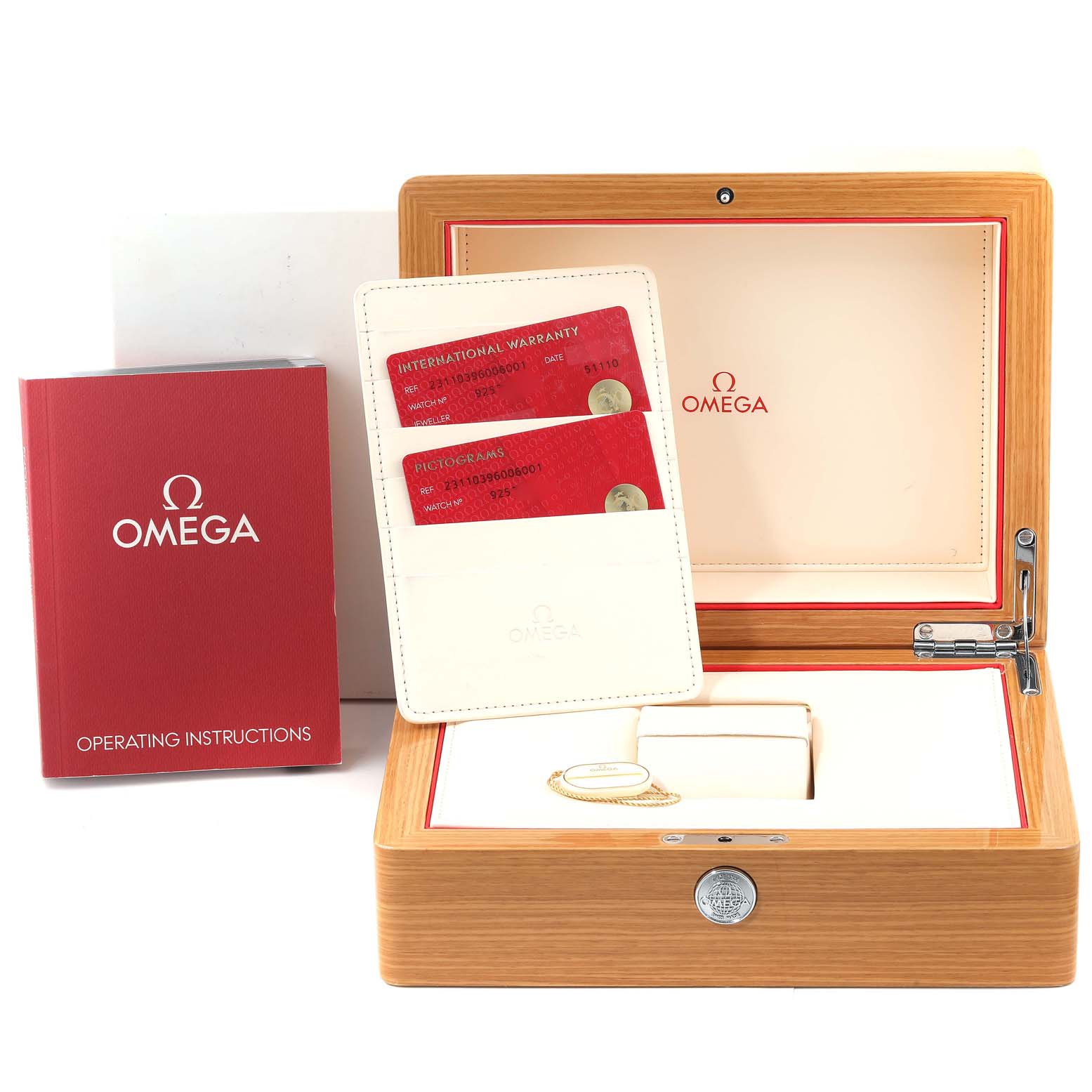 The image shows accessories for the Omega Aqua Terra 231.10.39.60.06.001 Men
s Stainless Steel Grey Dial 231.10.39.60.06.001 Men
s Stainless Steel Grey Dial watch, including a wooden box, warranty cards, and an operating instructions booklet.