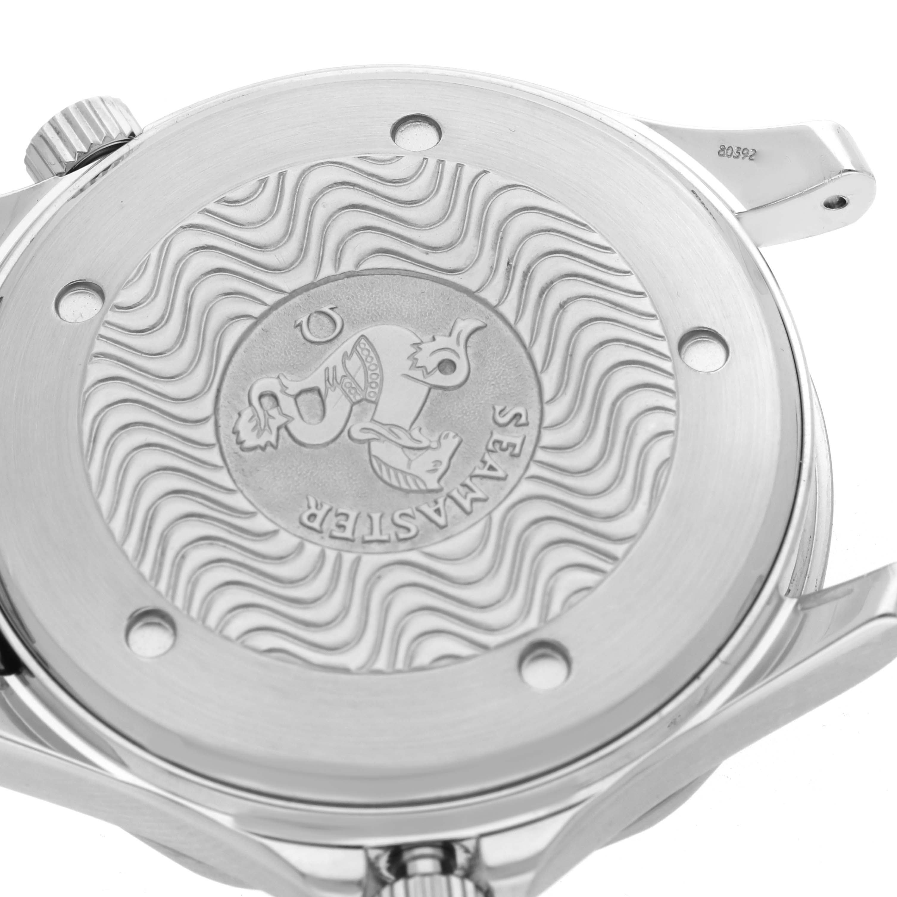 The image shows the case back of an Omega Seamaster 2531.80.00 Men
s Stainless Steel Blue Dial, highlighting its engraved design and wave pattern.