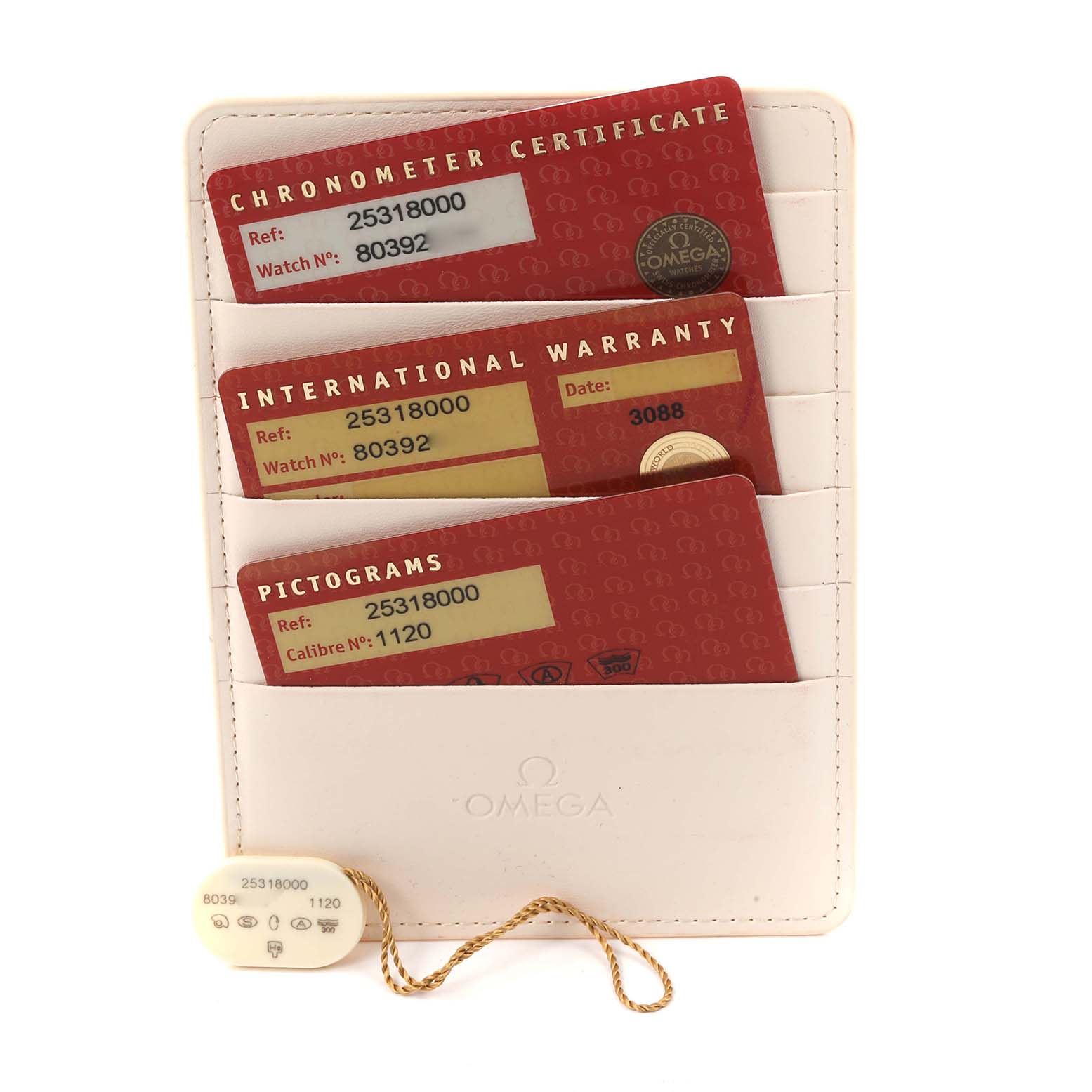 The image shows warranty and certification cards in a holder for an Omega Seamaster 2531.80.00 Men
s Stainless Steel Blue Dial watch, viewed from above.