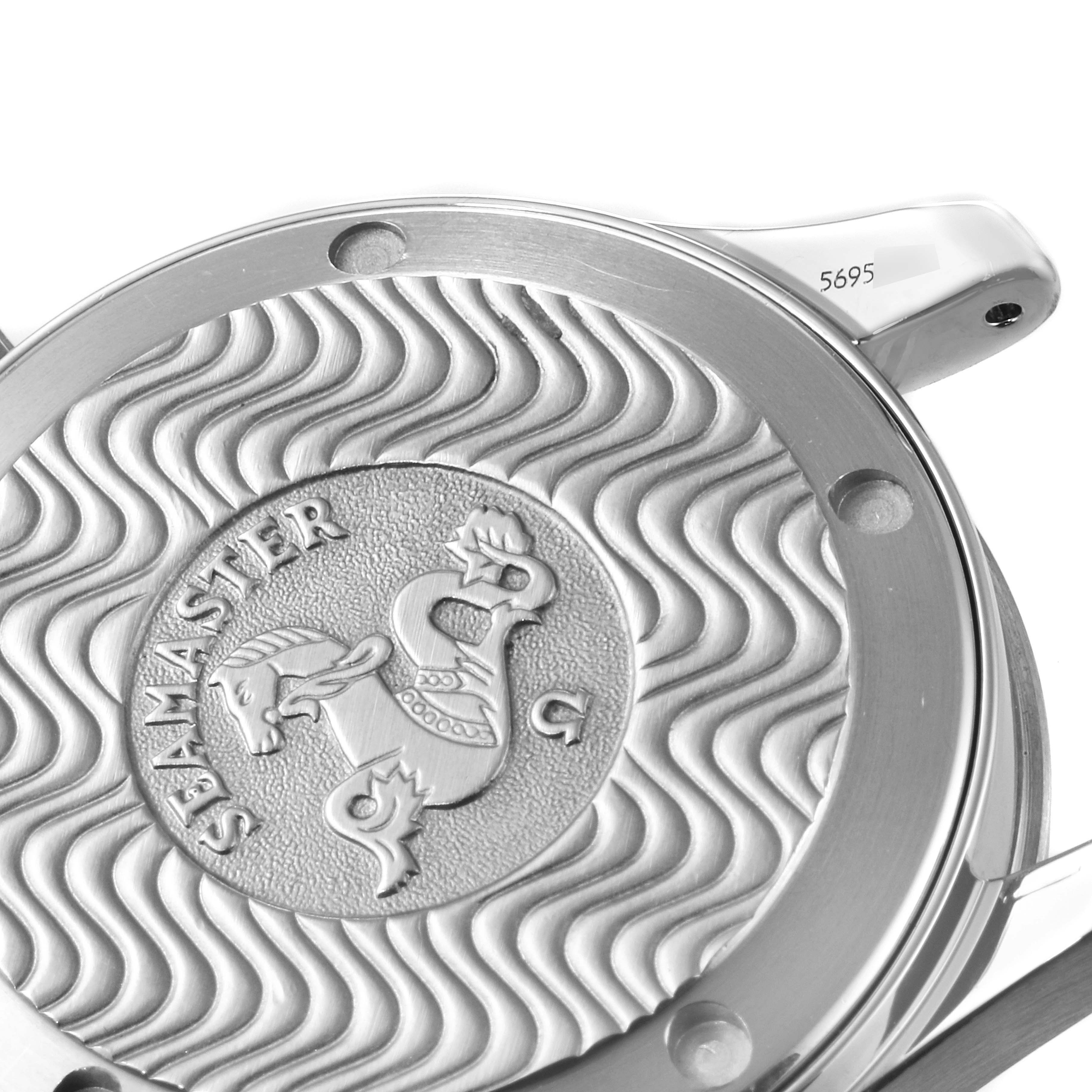 The image shows the back case of an Omega Seamaster 2262.50.00 Men's Stainless Steel Black Dial 2262.50.00 Men's Stainless Steel Black Dial watch featuring engraved sea horse and wave patterns.