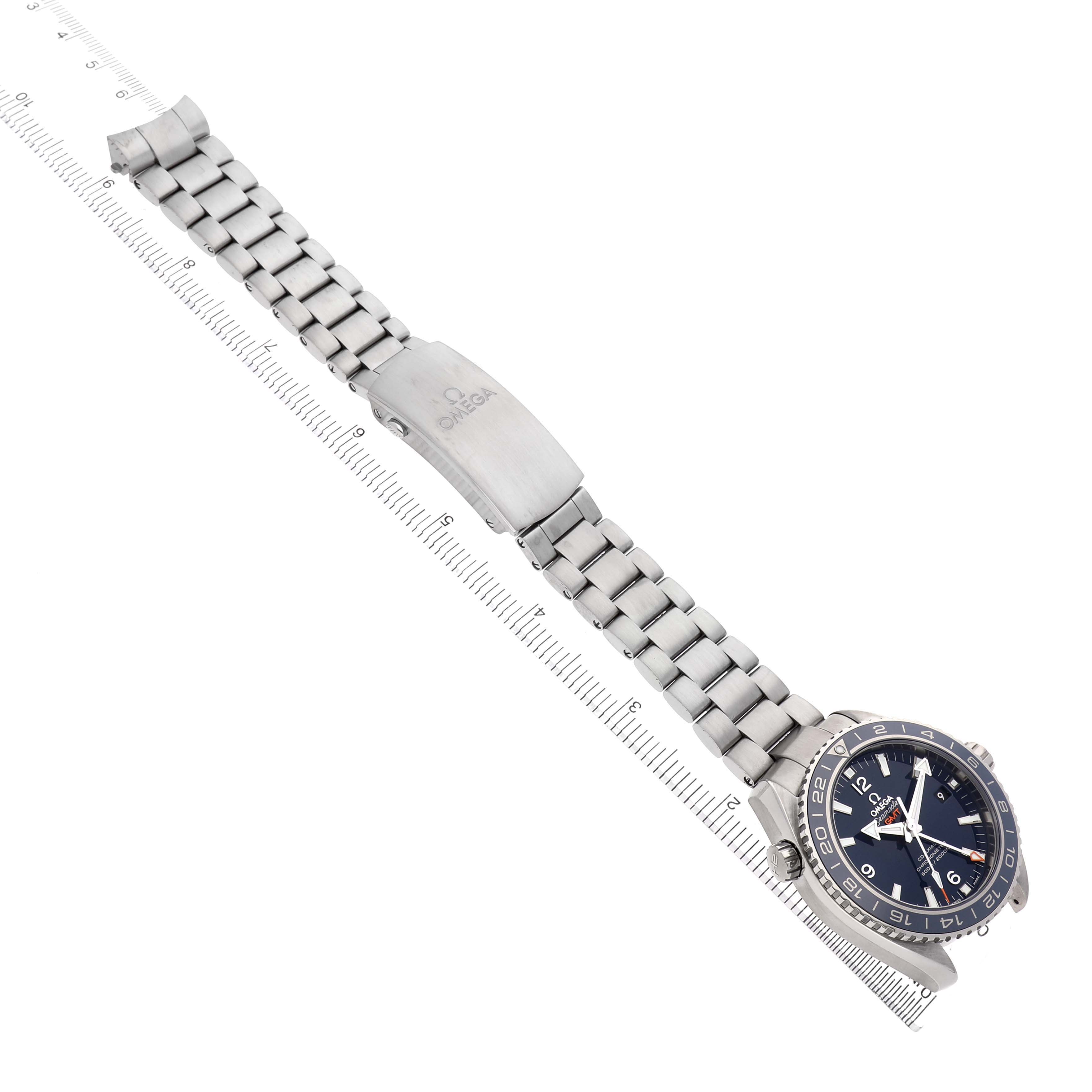The Omega Planet Ocean 232.92.44.22.03.001 Men's Titanium Blue Dial watch is shown diagonally, featuring its bracelet and crown side.