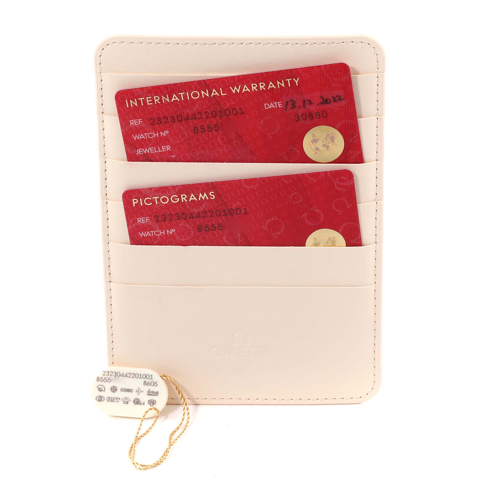 The image shows an Omega Planet Ocean 232.30.44.22.01.001 Men
s Stainless Steel Black Dial 232.30.44.22.01.001 Men
s Stainless Steel Black Dial model
s warranty cards and pictogram cards along with a tag, all placed in a white cardholder.