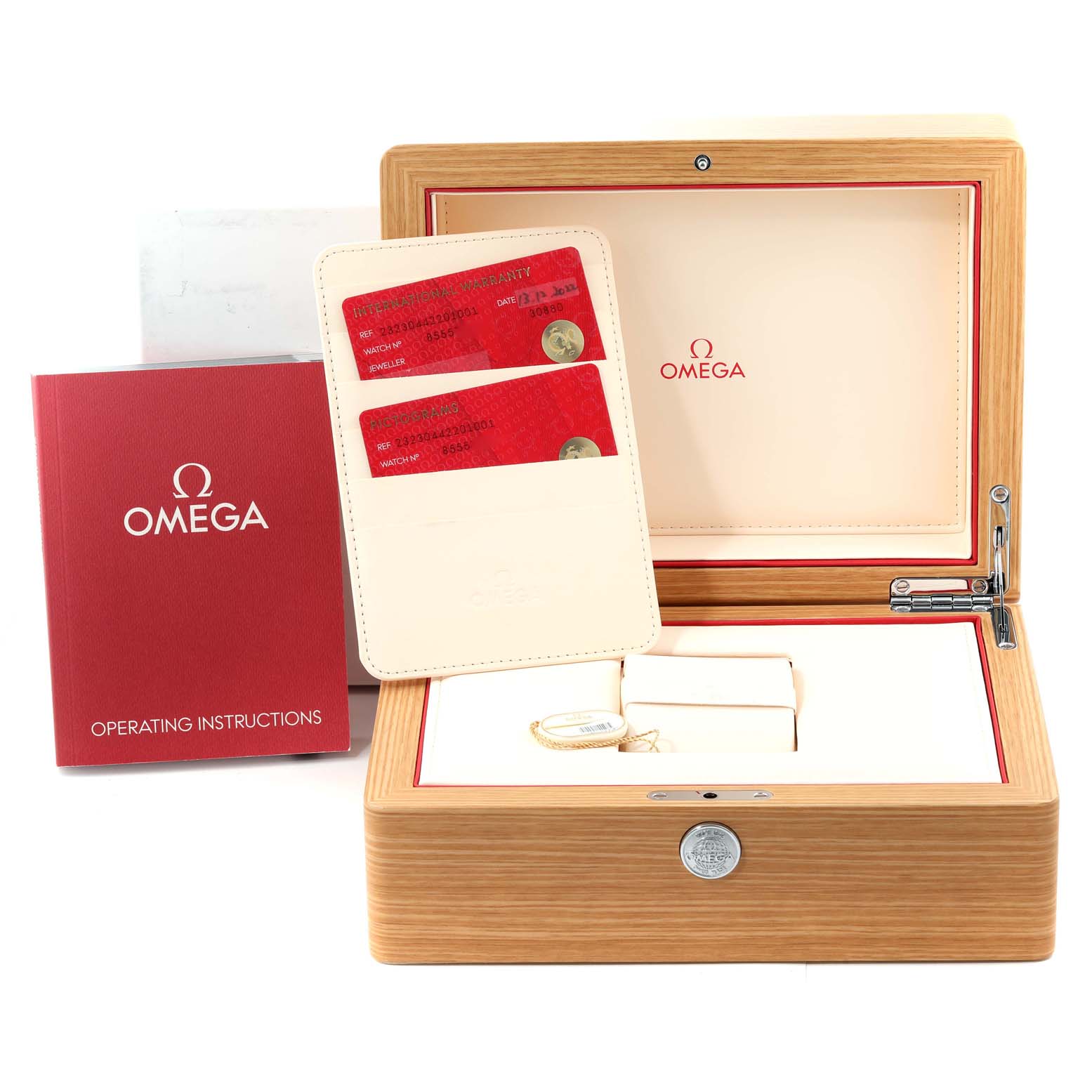 The image shows the wooden box and accessories for an Omega Planet Ocean 232.30.44.22.01.001 Men
s Stainless Steel Black Dial 232.30.44.22.01.001 Men
s Stainless Steel Black Dial watch, including operating instructions and certification cards.