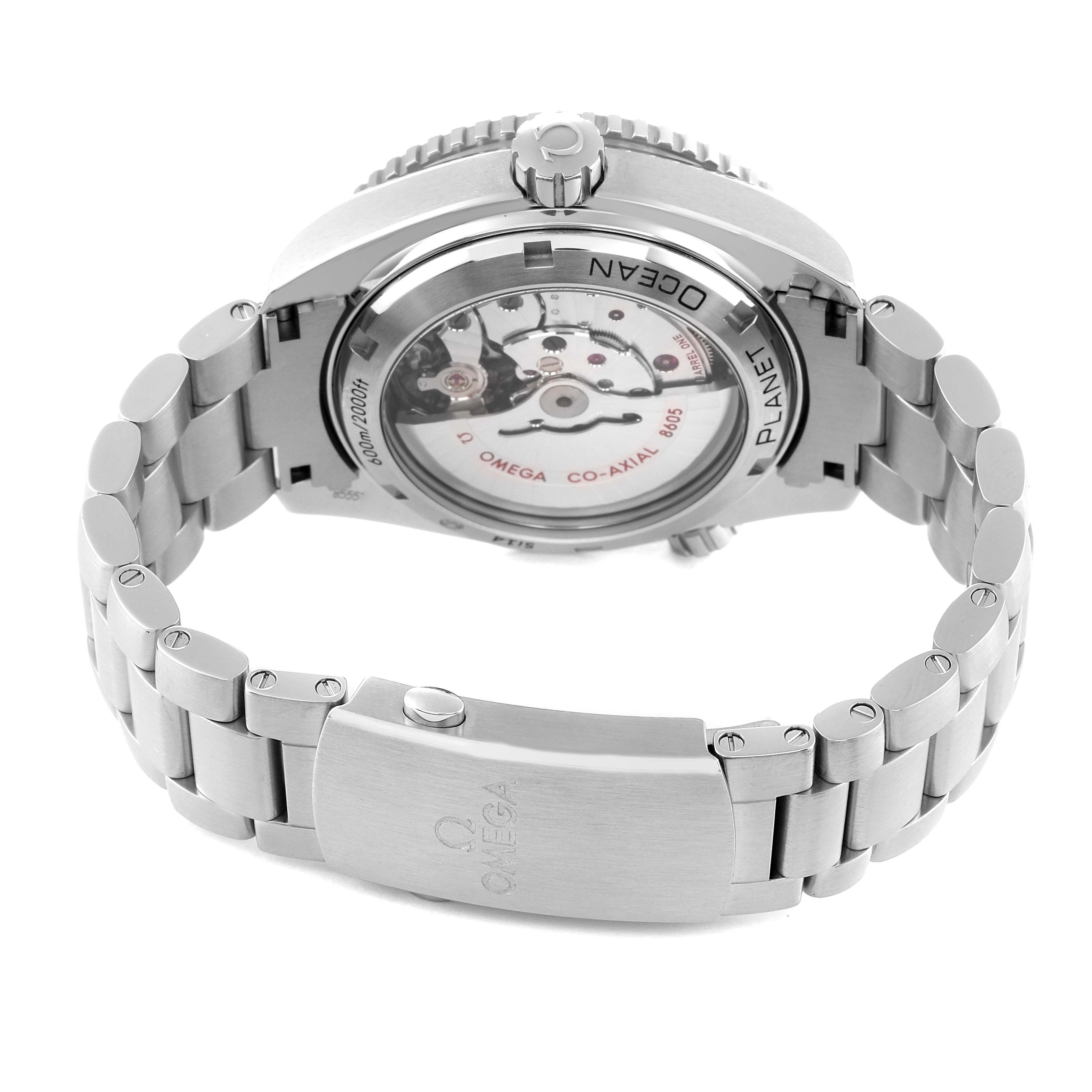 The Omega Planet Ocean 232.30.44.22.01.001 Men
s Stainless Steel Black Dial 232.30.44.22.01.001 Men
s Stainless Steel Black Dial watch is shown from the back, highlighting its movement, caseback, and stainless steel bracelet.