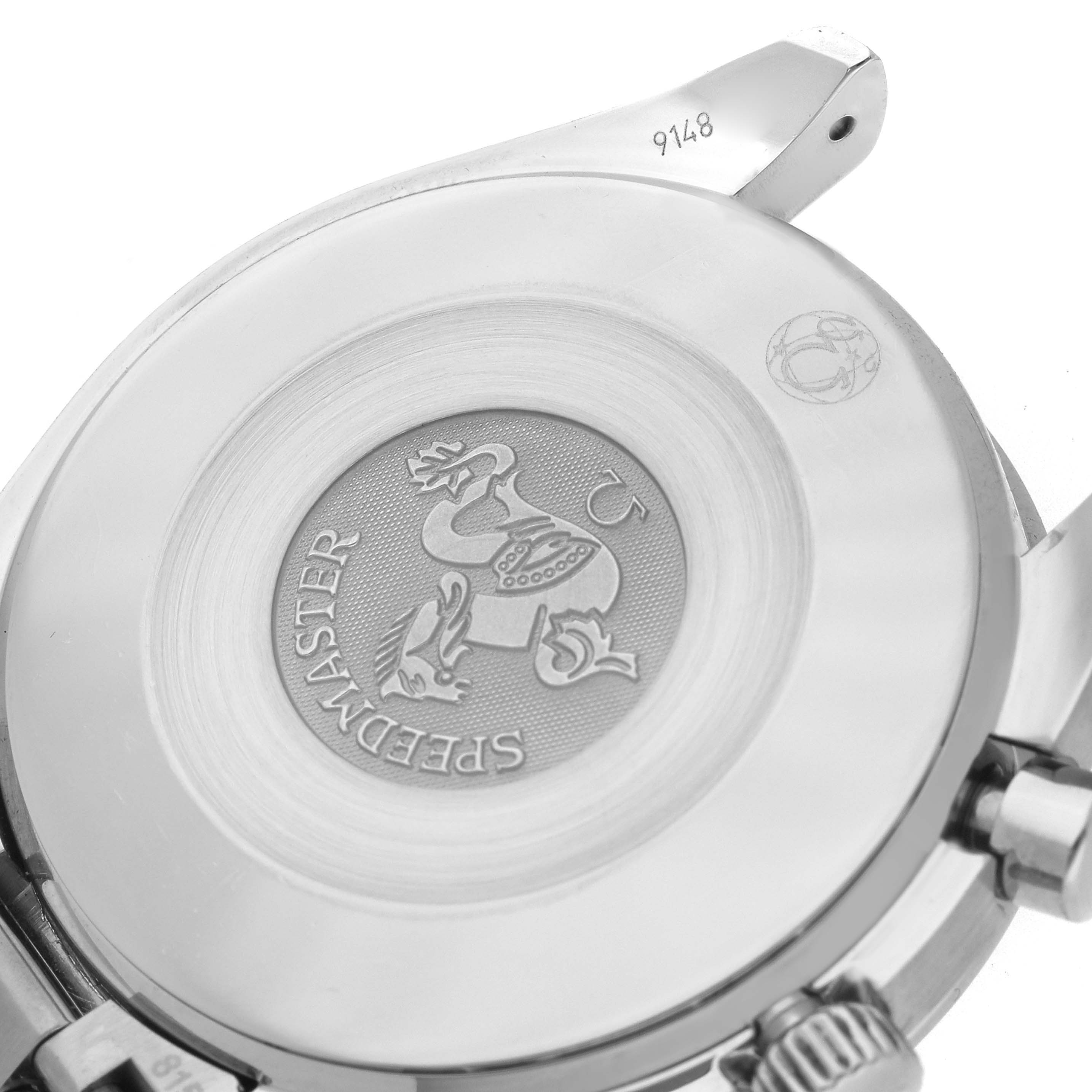 The image shows the back case of the Omega Speedmaster 3539.50.00 Men
s Stainless Steel Black Dial, highlighting its engraving and details.