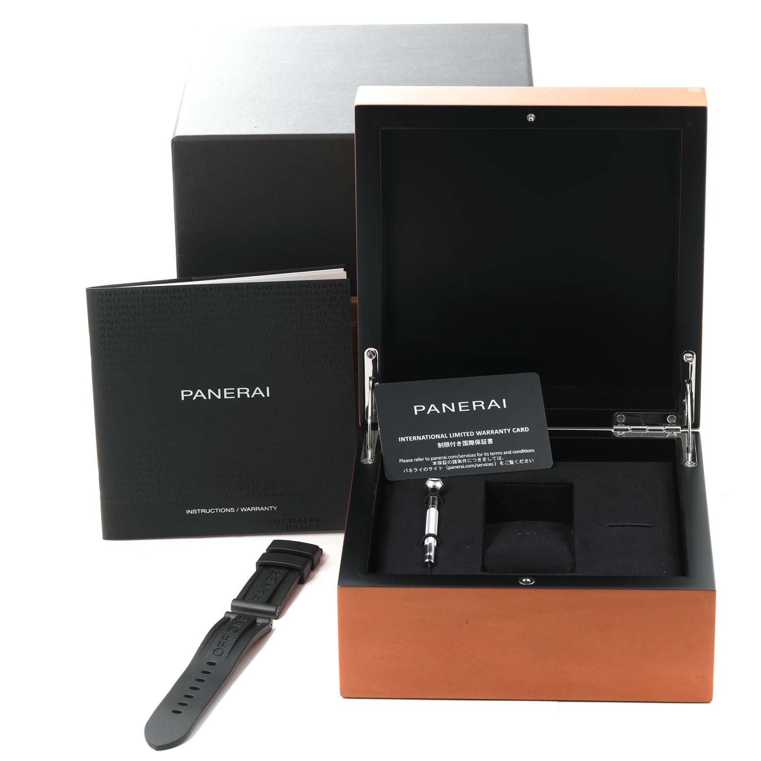 The image shows the Panerai Luminor PAM00335 Men's Ceramic Black Dial PAM00335 Men's Ceramic Black Dial watch box with warranty card, manual, extra strap, and tool from a slightly high angle.
