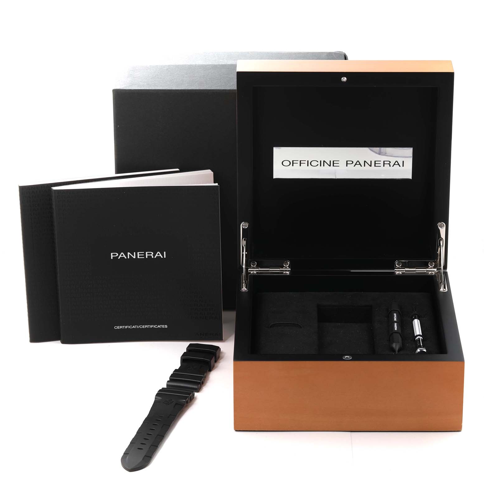 This image shows the packaging, manuals, a rubber strap, and tools for the Panerai Submersible PAM01389 Men's Titanium Black Dial PAM01389 Men's Titanium Black Dial watch.