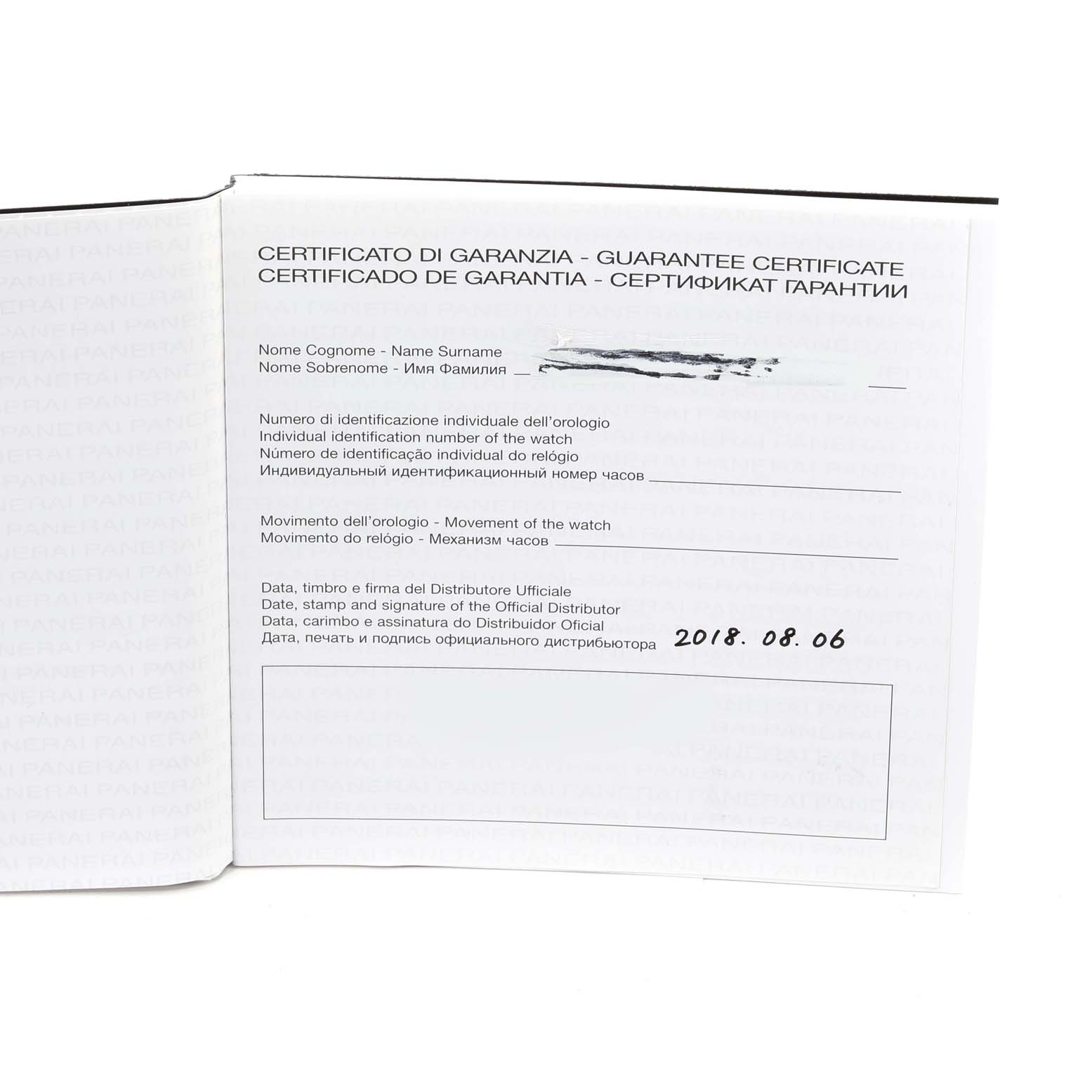 This image shows the guarantee certificate for the Panerai Submersible PAM01389 Men's Titanium Black Dial PAM01389 Men's Titanium Black Dial watch, displayed open.