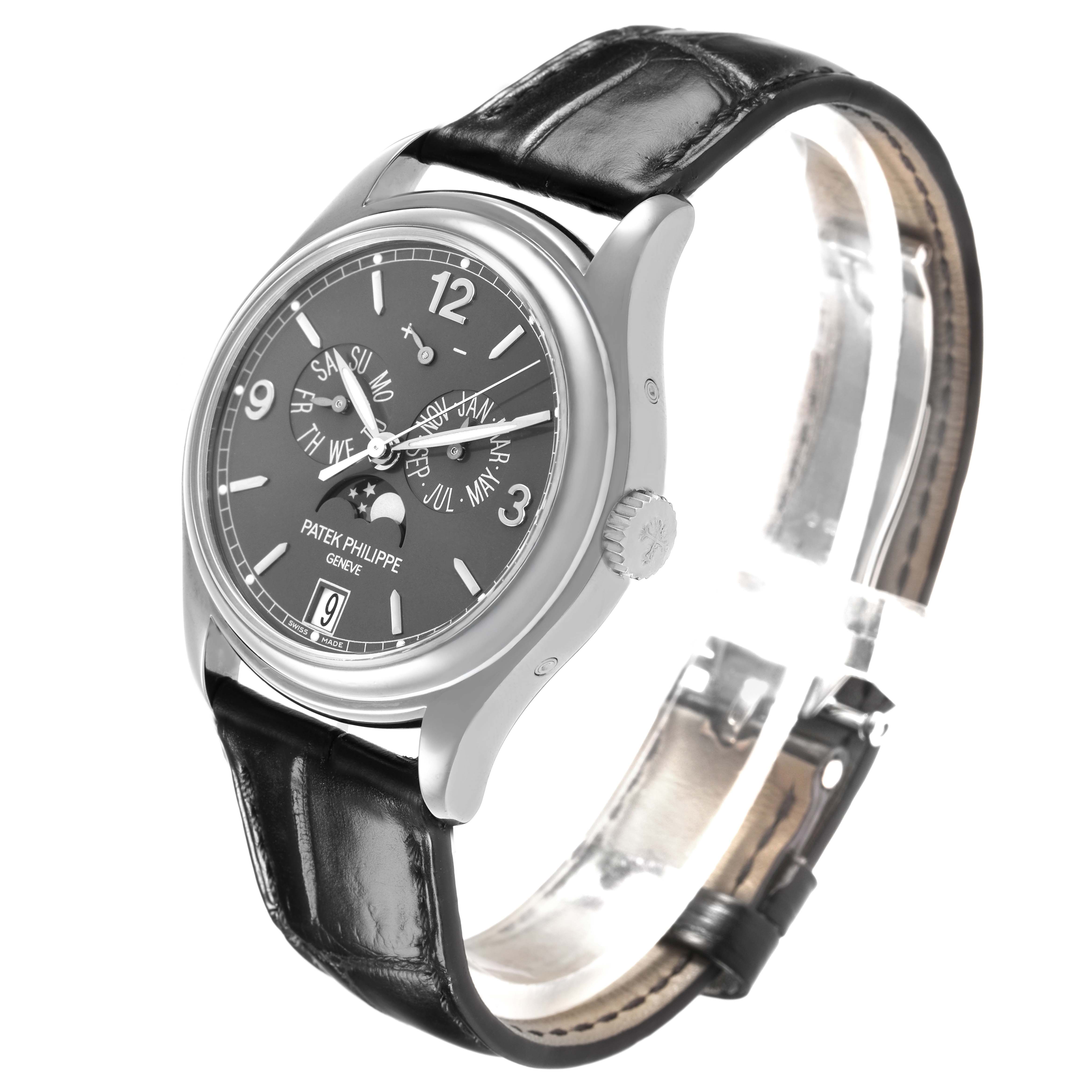 The Patek Philippe Complications 5146G-001 Men's White Gold Grey Dial watch is shown at an angled view, highlighting the dial, case, crown, and black leather strap.