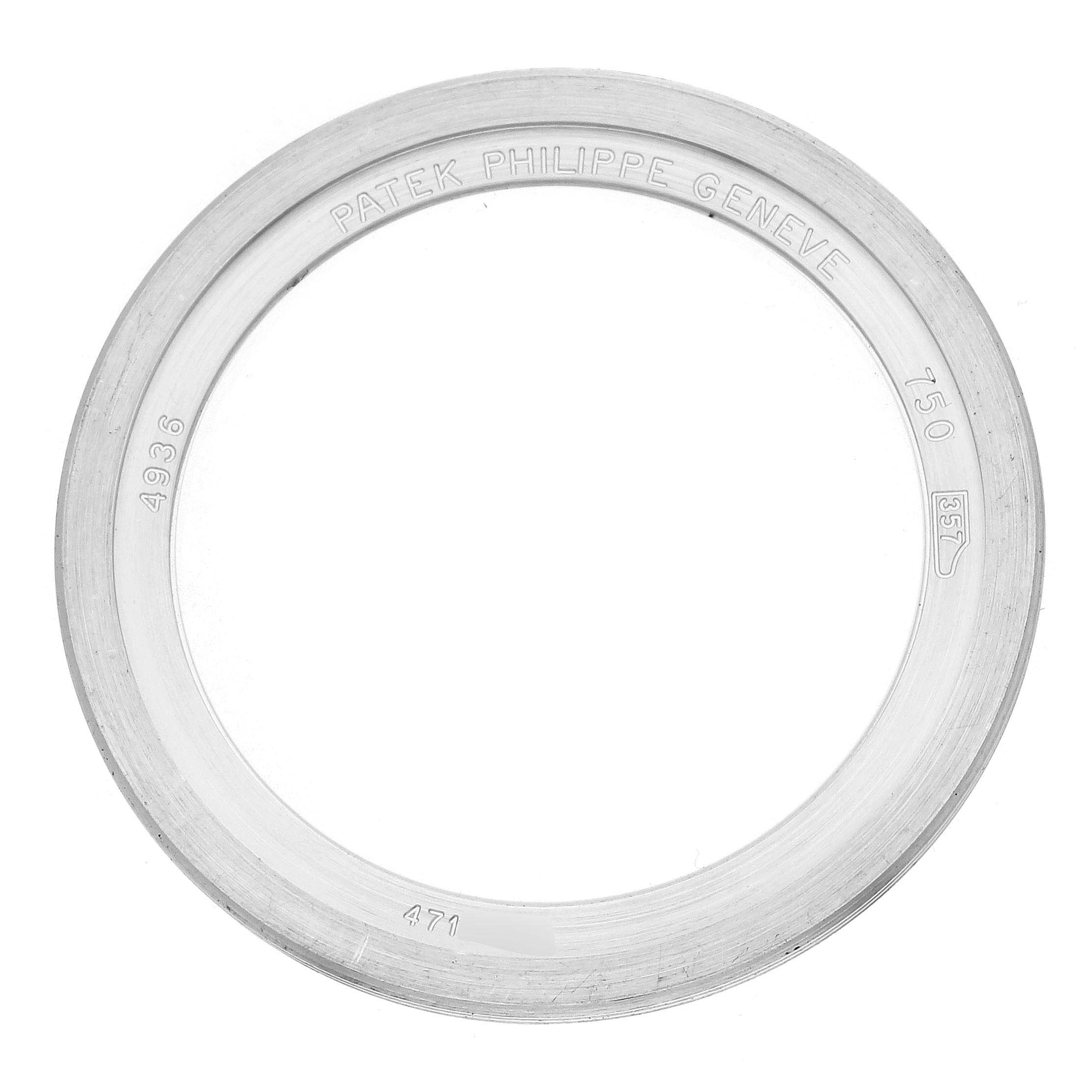 The image shows a circular watch bezel engraved with "Patek Philippe Geneve," indicating a Complications model by Patek Philippe.