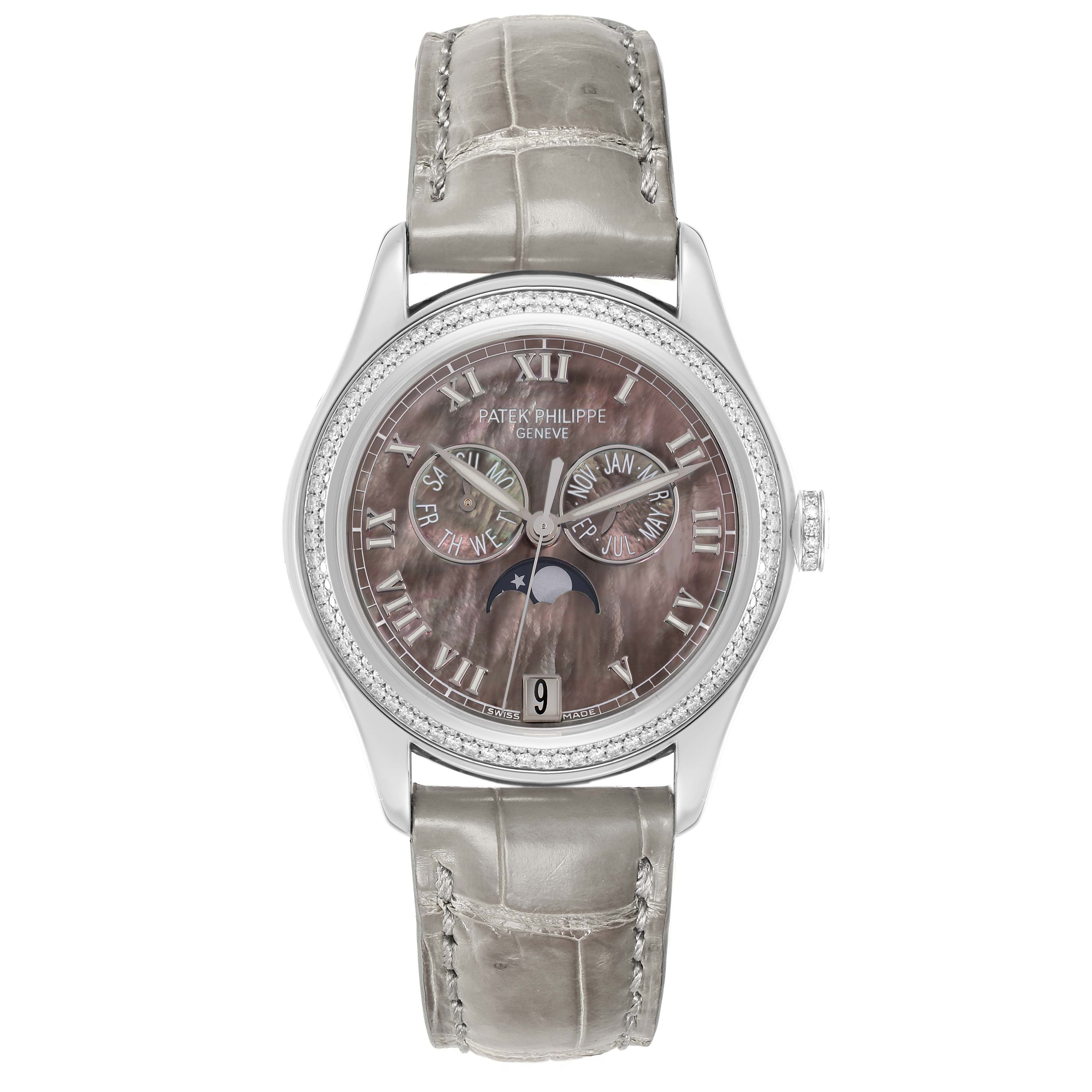 The Patek Philippe Complications 4936 Men
s White Gold Mother of Pearl Dial watch is shown from a top view, highlighting its dial, strap, and bezel details.