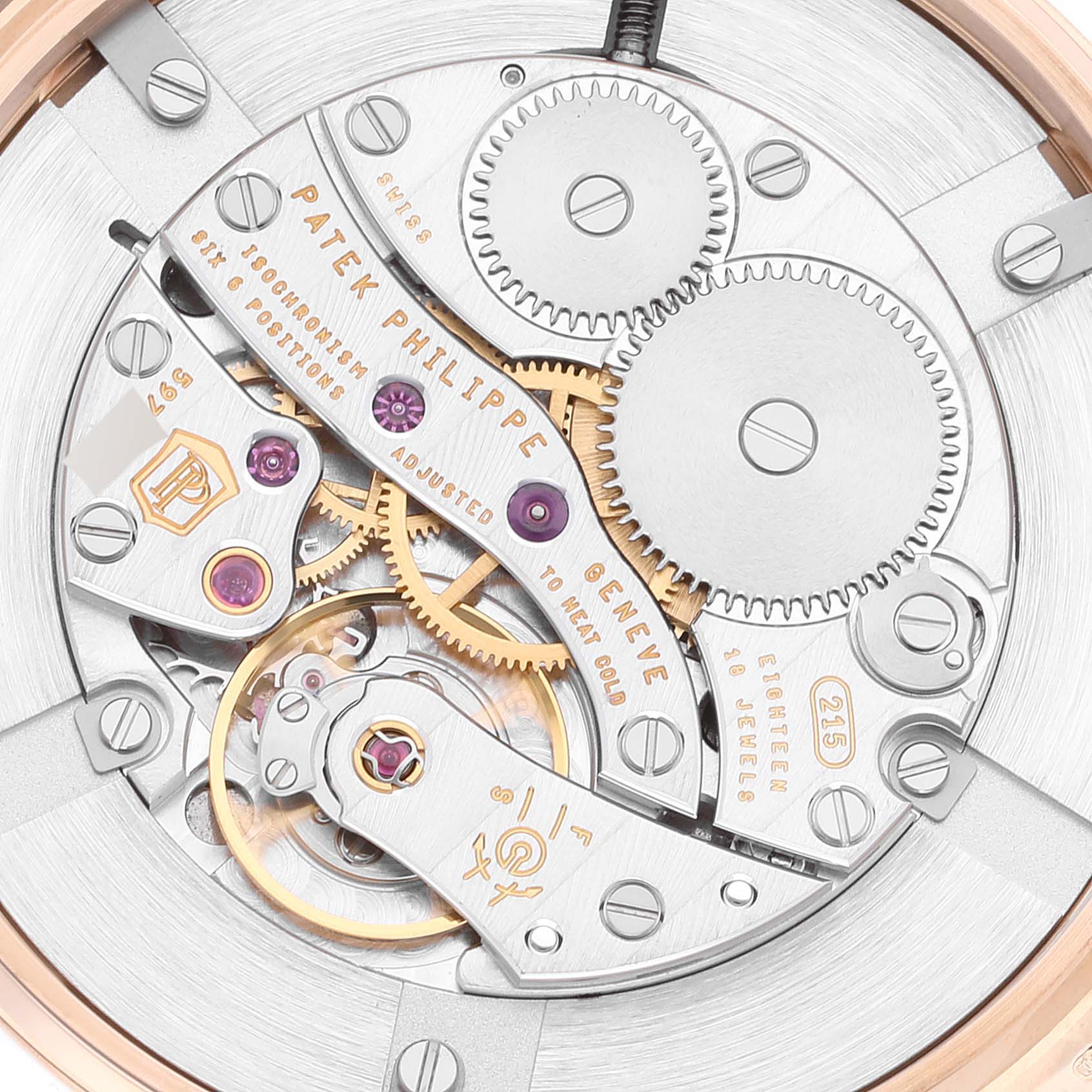 This image shows the movement and internal gears of a Patek Philippe Calatrava 7122/200R Women's Rose Gold White Dial 7122/200R Women's Rose Gold White Dial watch from a close-up, top-down angle.