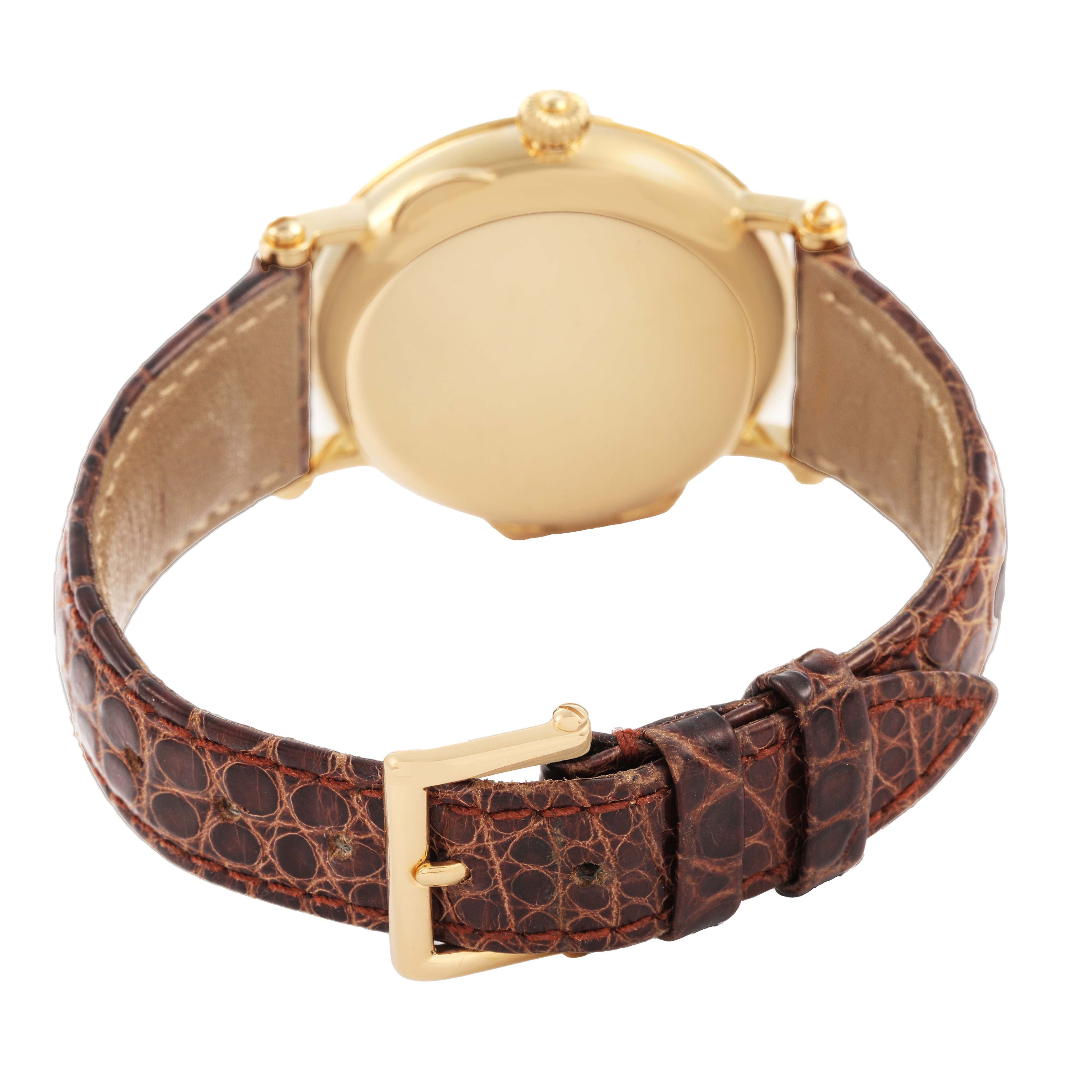 The image shows the back and strap of the Patek Philippe Calatrava 5053J Men's Yellow Gold White Dial watch at an angle highlighting the buckle and case.