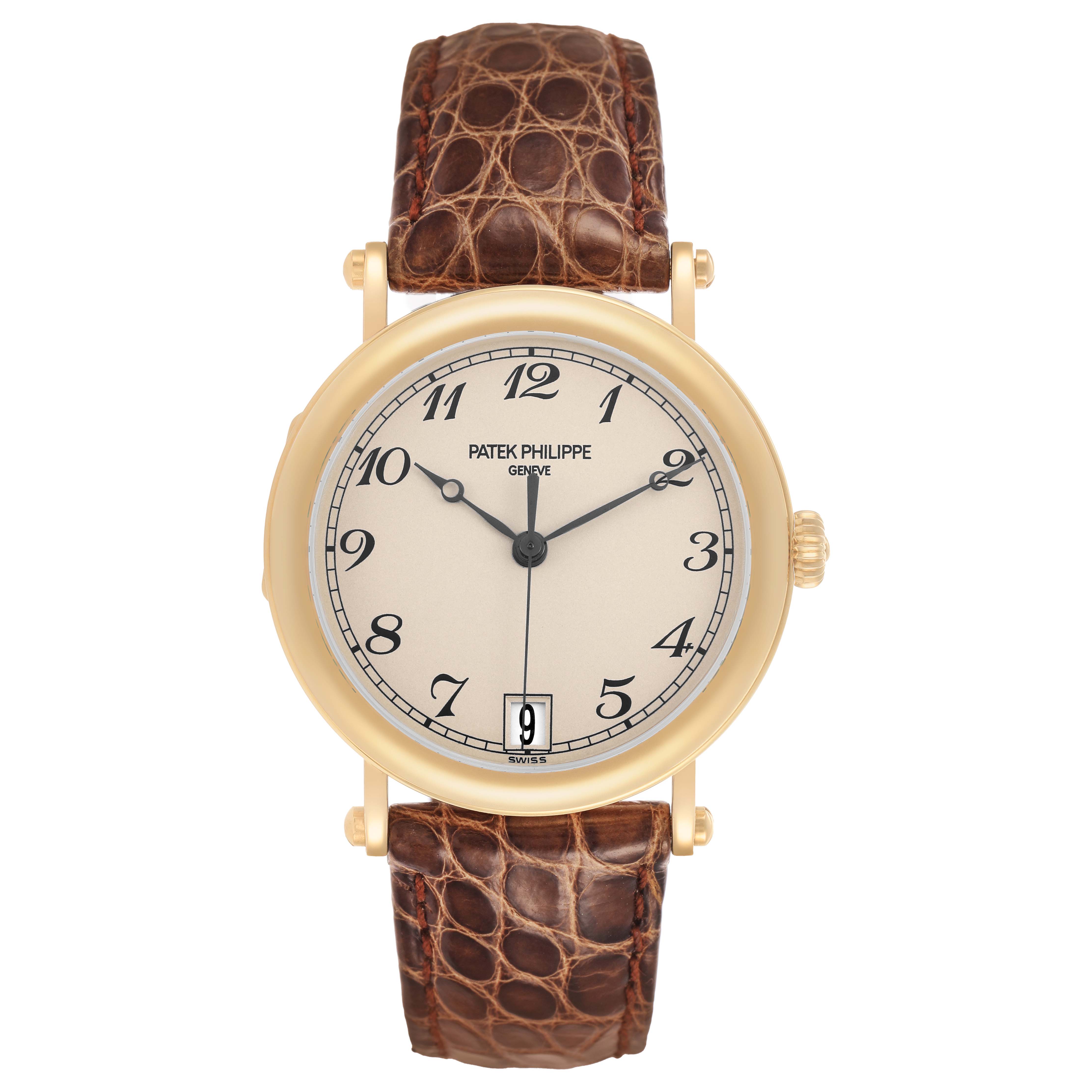 The image shows a front view of a Patek Philippe Calatrava 5053J Men's Yellow Gold White Dial watch, highlighting the dial, case, and leather strap.