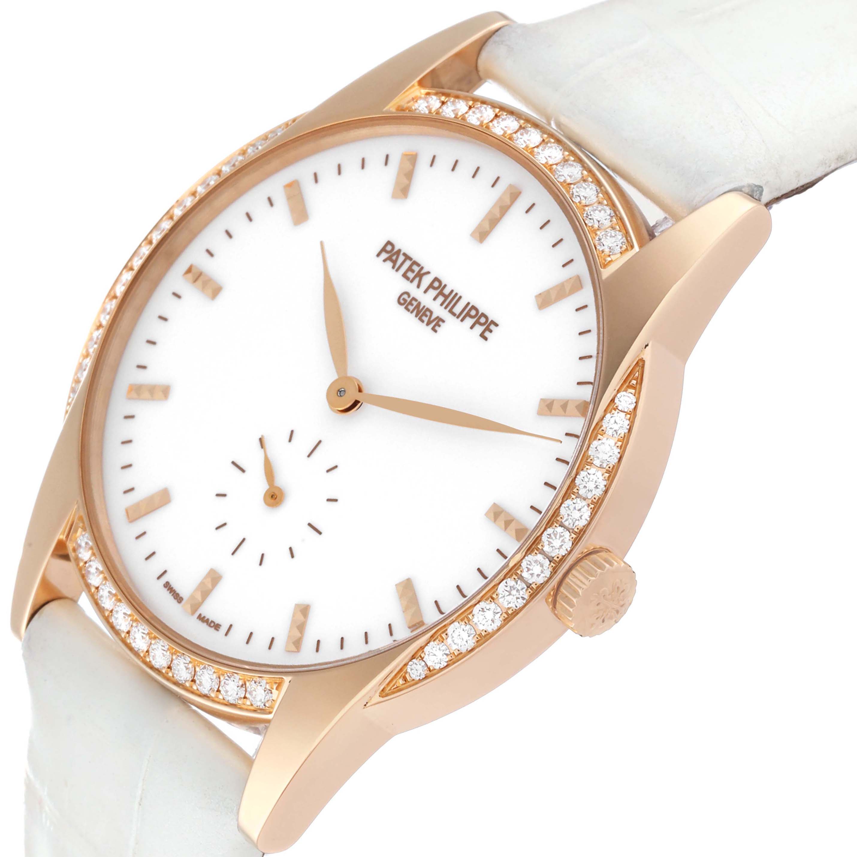 The image shows a close-up, angled view of a Patek Philippe Calatrava 7122/200R Women's Rose Gold White Dial 7122/200R Women's Rose Gold White Dial watch, highlighting the dial, crown, and diamond-set bezel.