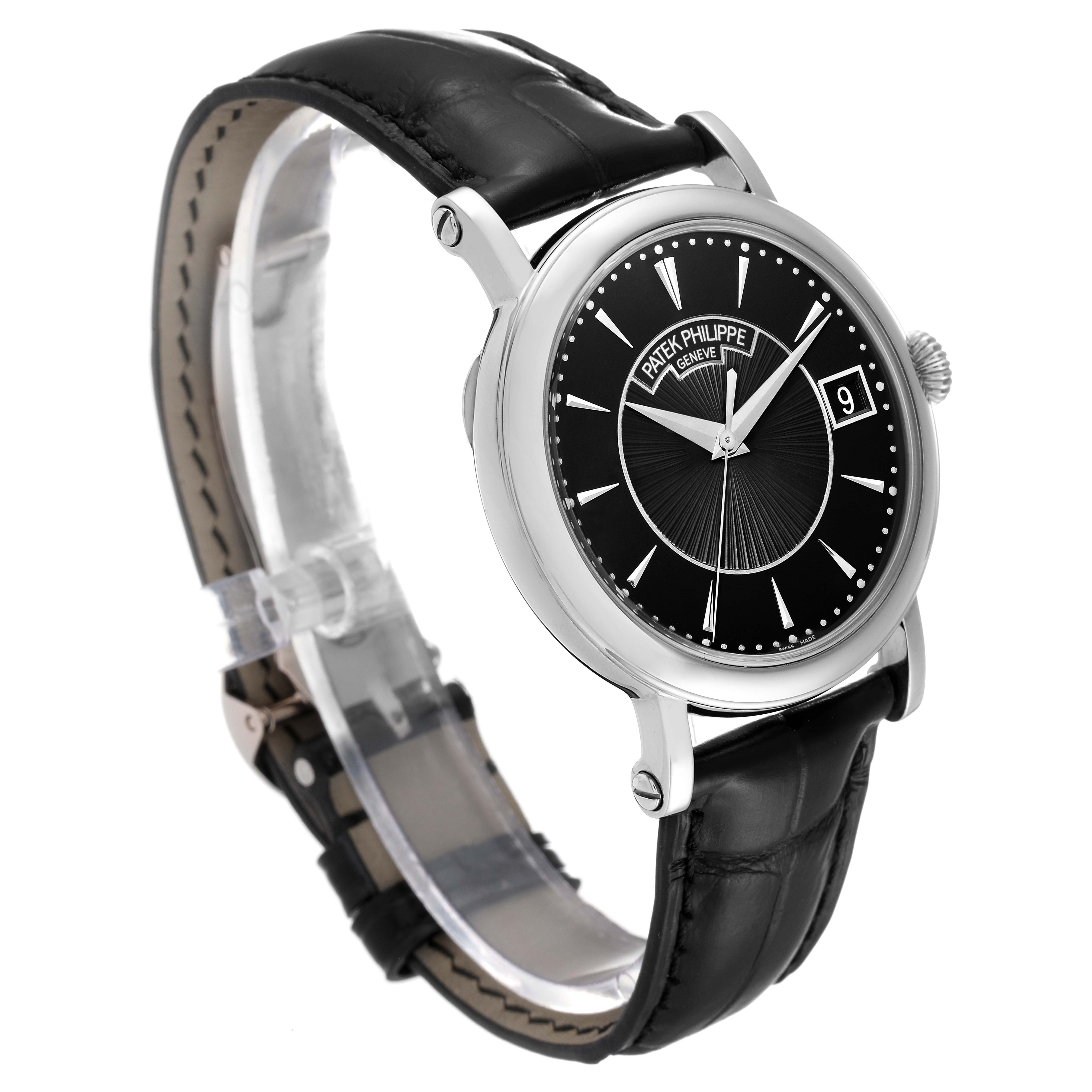 The Patek Philippe Calatrava 5153G Men's White Gold Black Dial 5153G Men's White Gold Black Dial watch is shown at a slight angle displaying its black dial, date window, and leather strap.