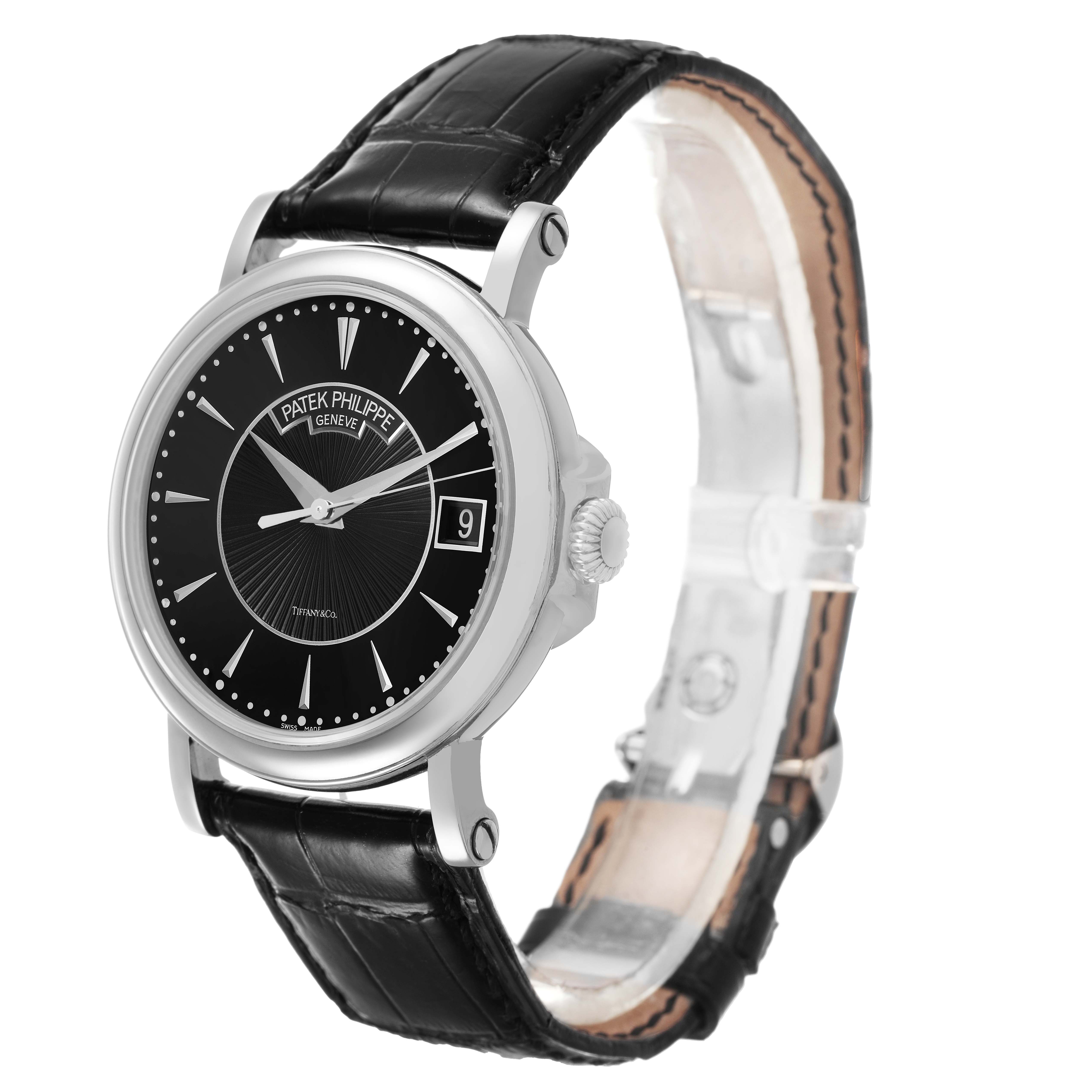 The Patek Philippe Calatrava 5153G-001 Men's White Gold Black Dial watch is shown at a three-quarter angle, displaying its black dial, crown, bezel, and leather strap.