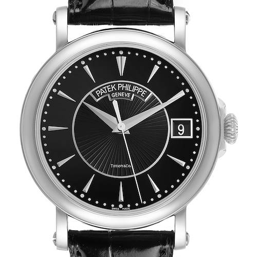 The image shows a frontal view of a Patek Philippe Calatrava 5153G-001 Men's White Gold Black Dial watch, highlighting the dial, hands, and date window.