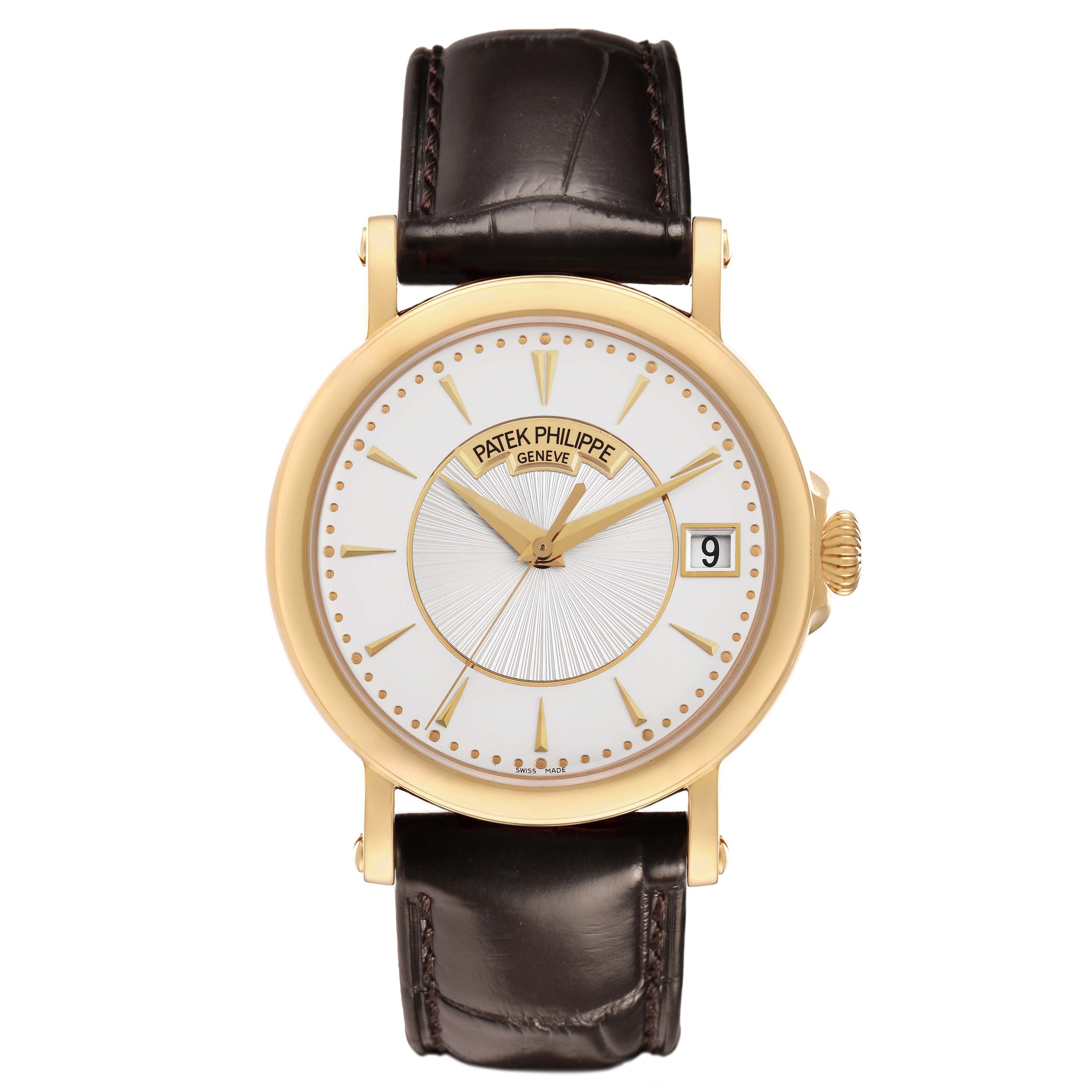 The Patek Philippe Calatrava 5153J Men's Yellow Gold Silver Dial watch is shown from a top view, displaying face, hands, crown, and leather strap.