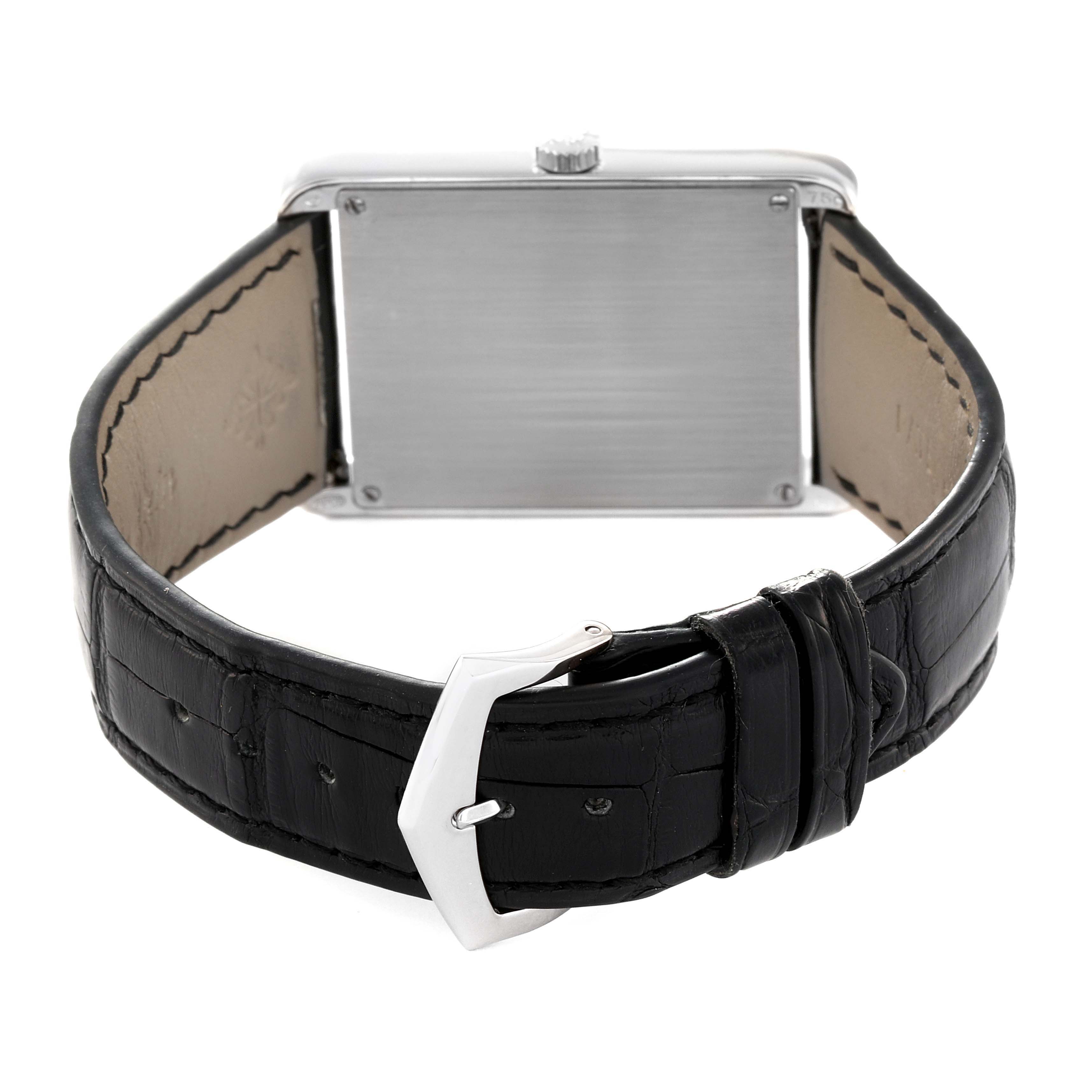 The image shows the back view of a Patek Philippe Gondolo 5112G Men's White Gold Black Dial 5112G Men's White Gold Black Dial watch, highlighting the black leather strap and buckle.