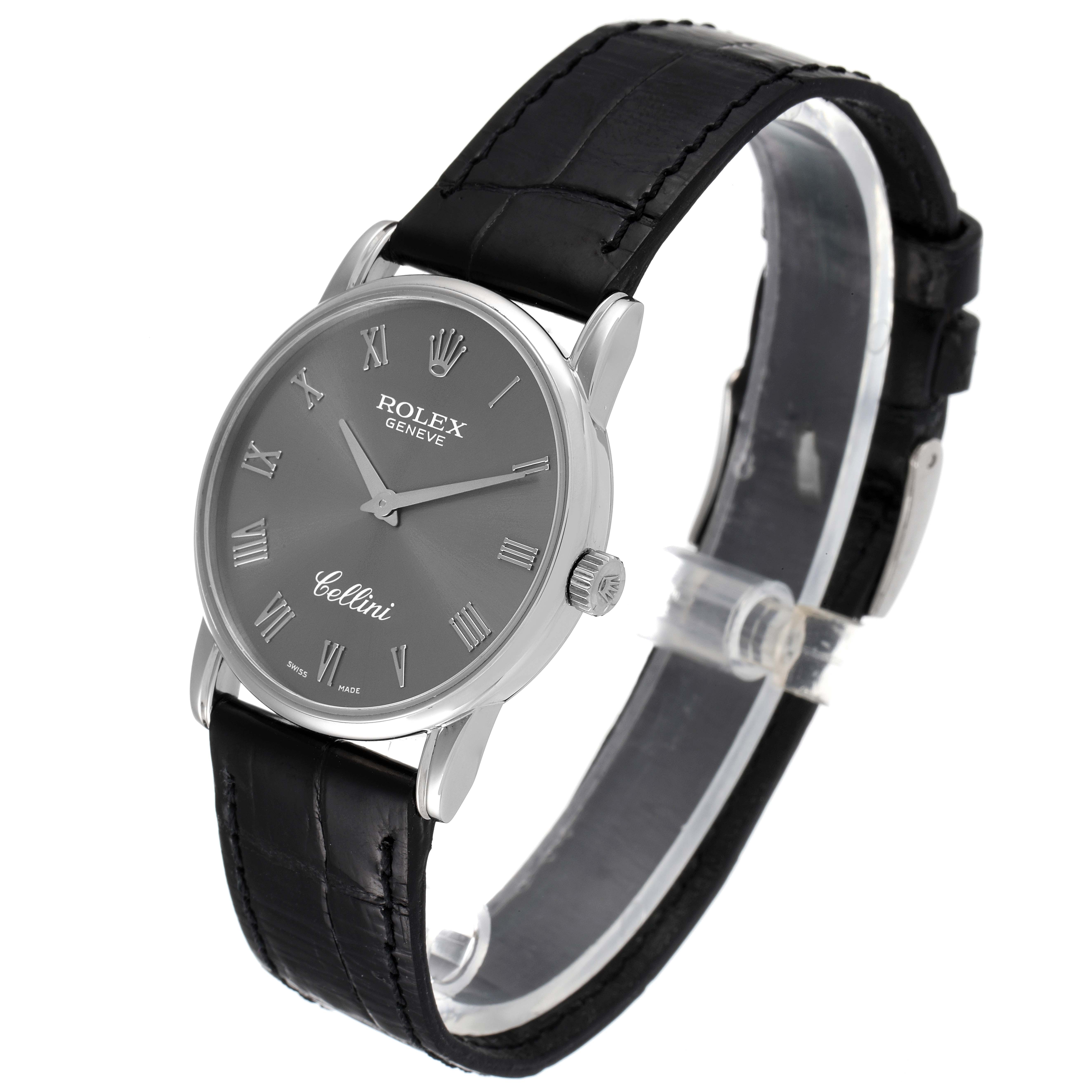 The Rolex Cellini 5116 Men's White Gold Grey Dial 5116 Men's White Gold Grey Dial watch is showcased at an angle, displaying the face, bezel, crown, and black leather strap.