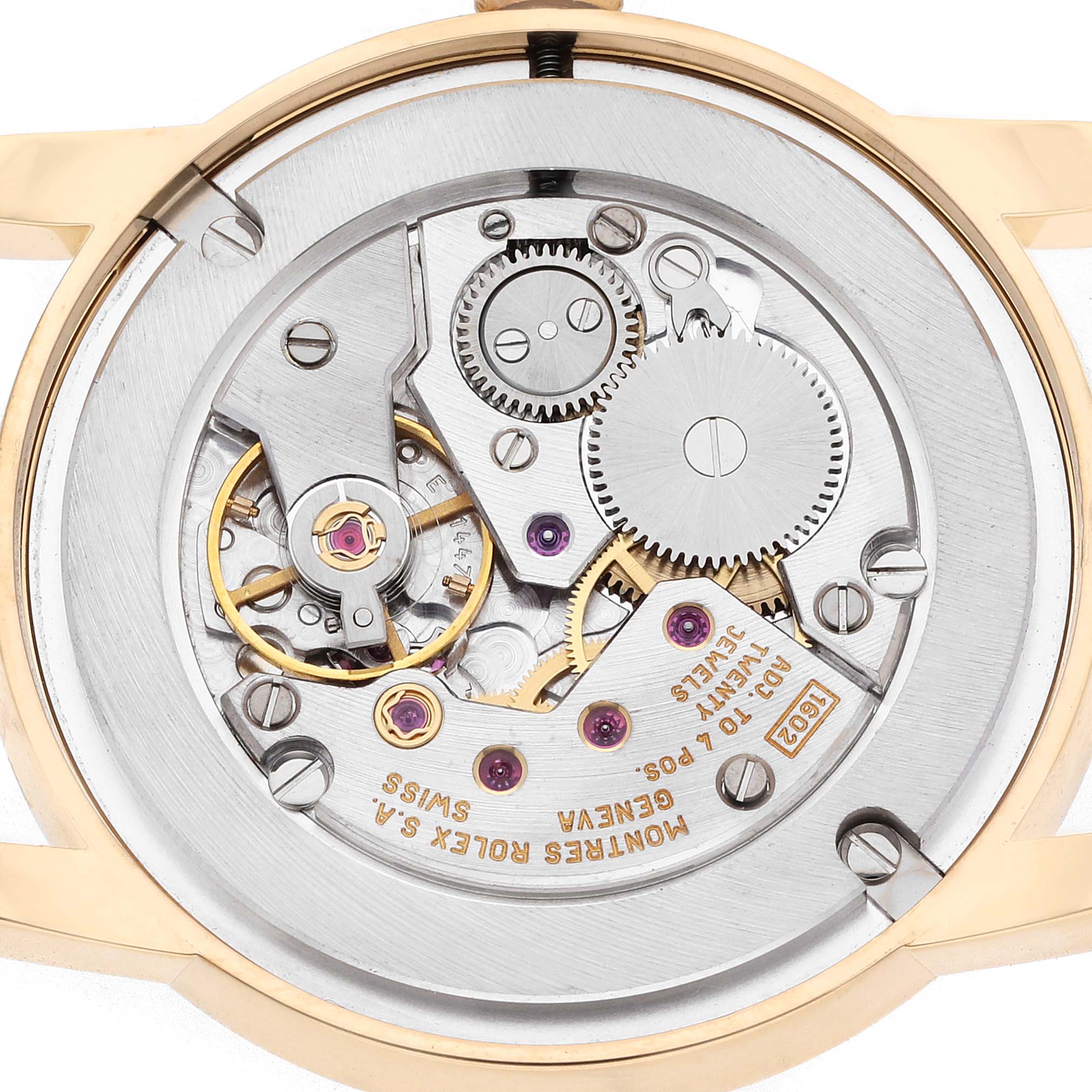 The image shows the back view of the Rolex Cellini 5116 Men
s Yellow Gold Beige Dial watch, highlighting its intricate mechanical movement components.