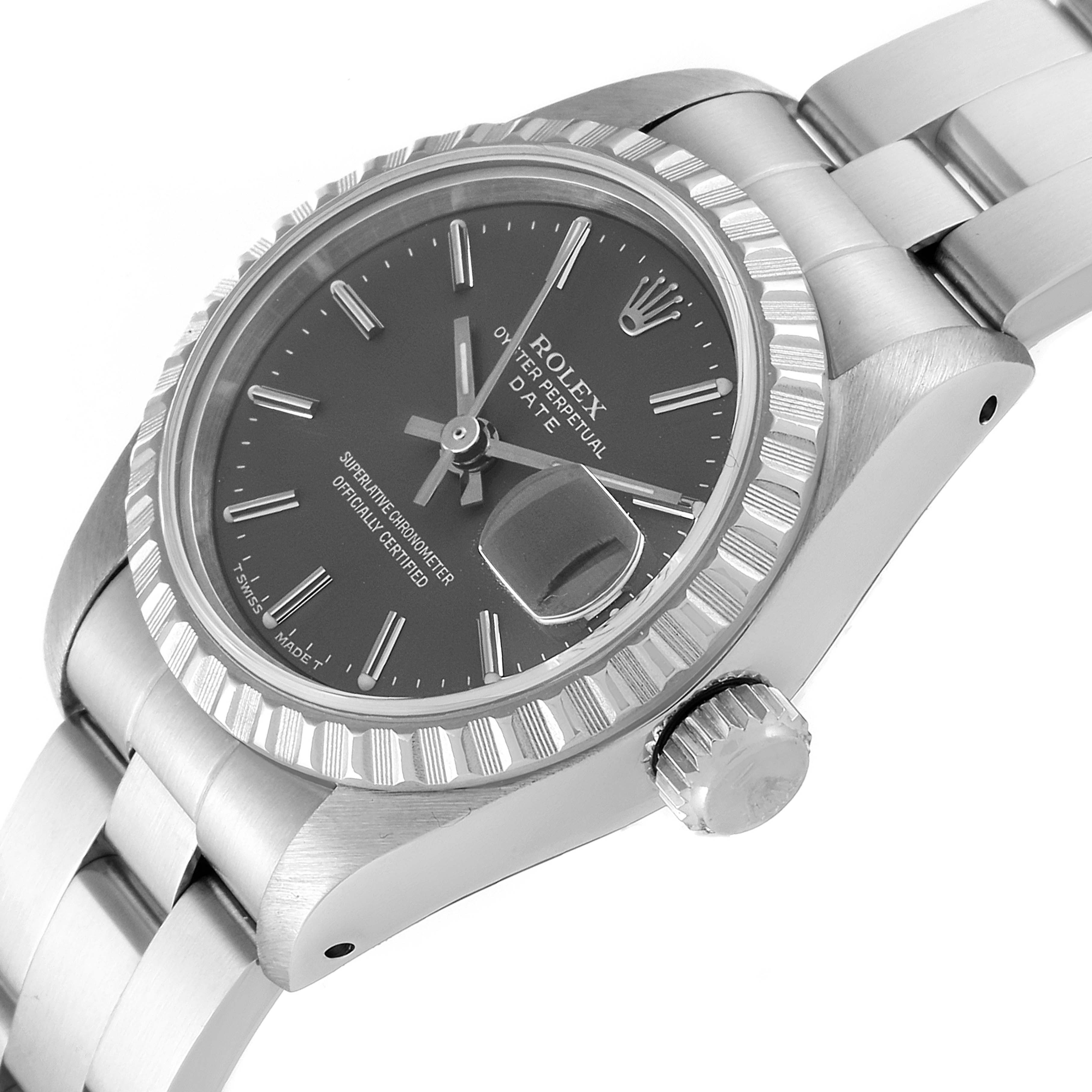 The image shows a Rolex Date 69240 Women's Stainless Steel Grey Dial 69240 Women's Stainless Steel Grey Dial model watch at an angle, highlighting the face, bezel, crown, and part of the bracelet.