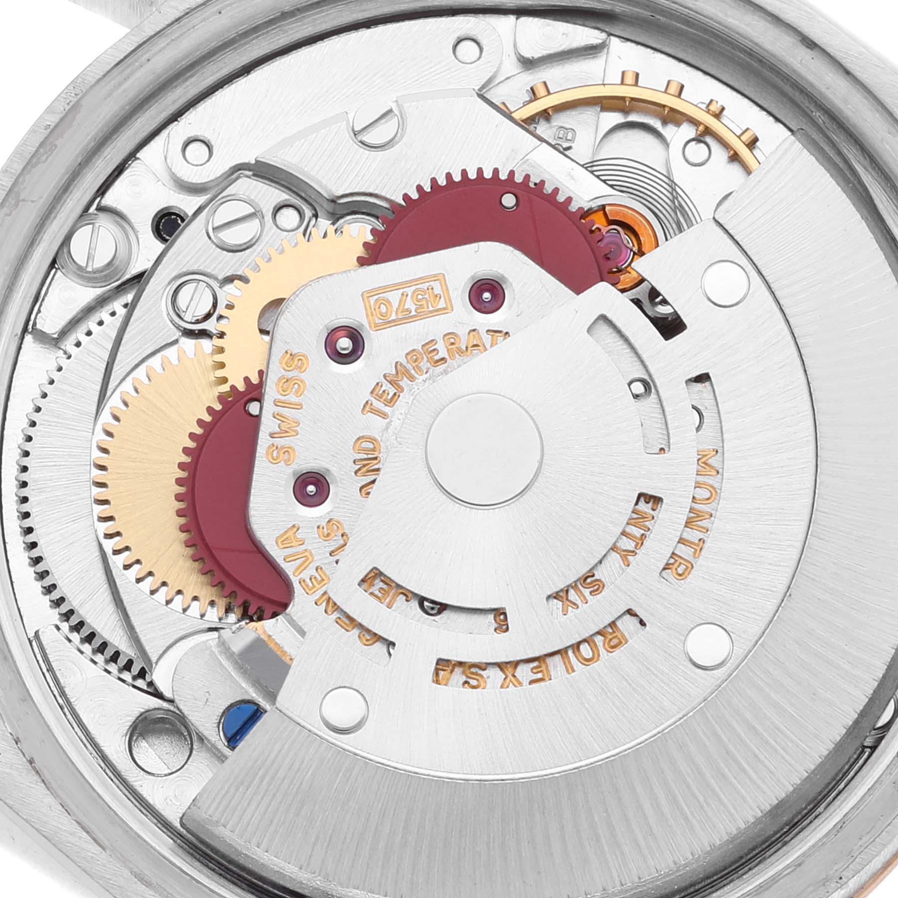 This image shows a close-up of the inner workings of a Rolex Vintage Collection 1500 Men's Steel and Gold (two tone) Black Dial 1500 Men's Steel and Gold (two tone) Black Dial watch.