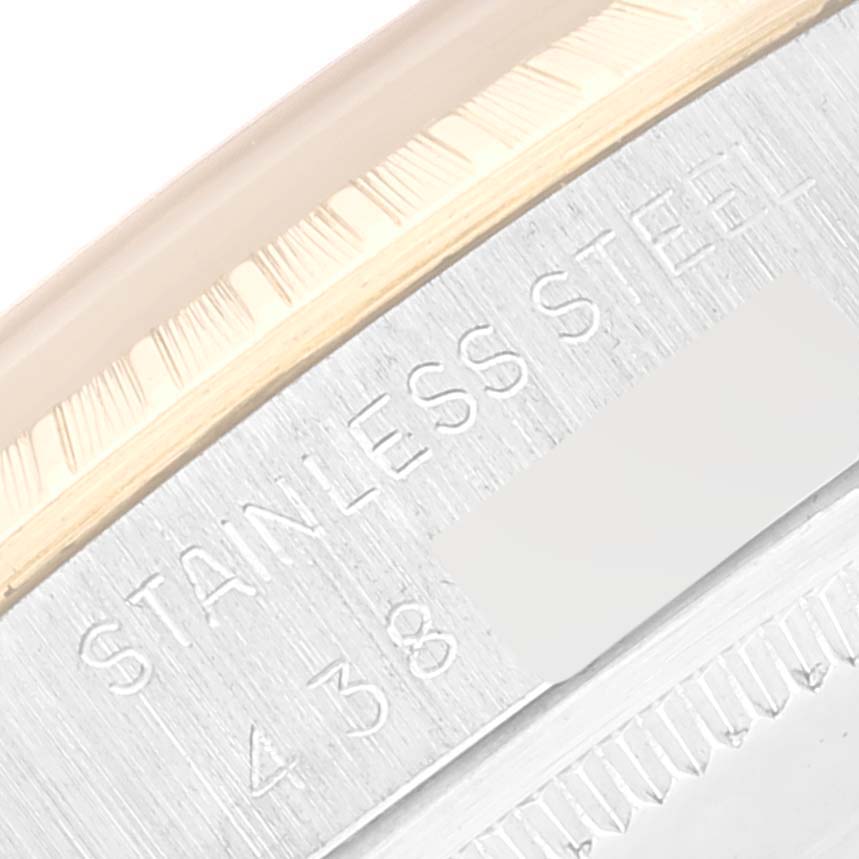 This close-up image shows the bezel and stainless steel casing of the Rolex Vintage Collection 1500 Men's Steel and Gold (two tone) Black Dial 1500 Men's Steel and Gold (two tone) Black Dial watch.