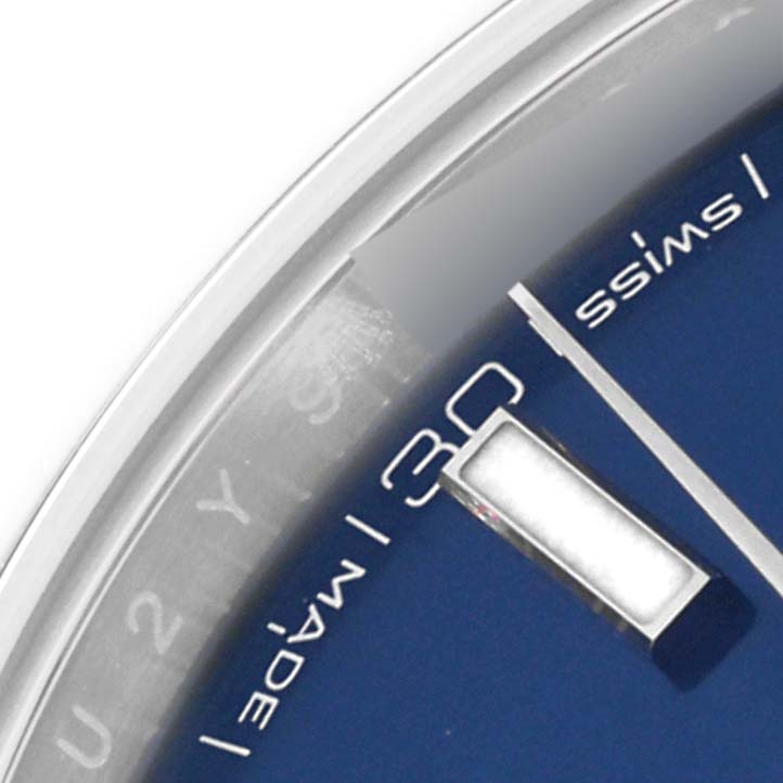 The image displays a close-up of a Datejust 41 Rolex watch, highlighting the dial section with the date and part of the minute hand.