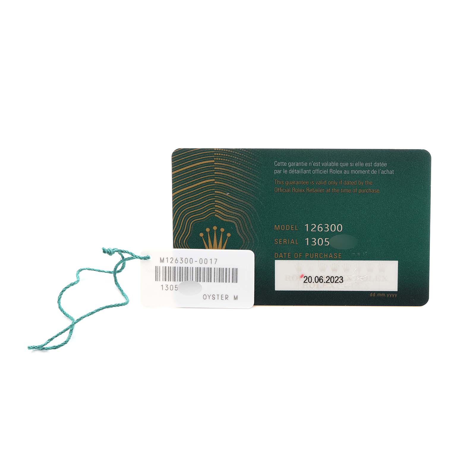 This image shows the warranty card and a tag for the Rolex Datejust 126300 Men
s Stainless Steel Blue Dial model.