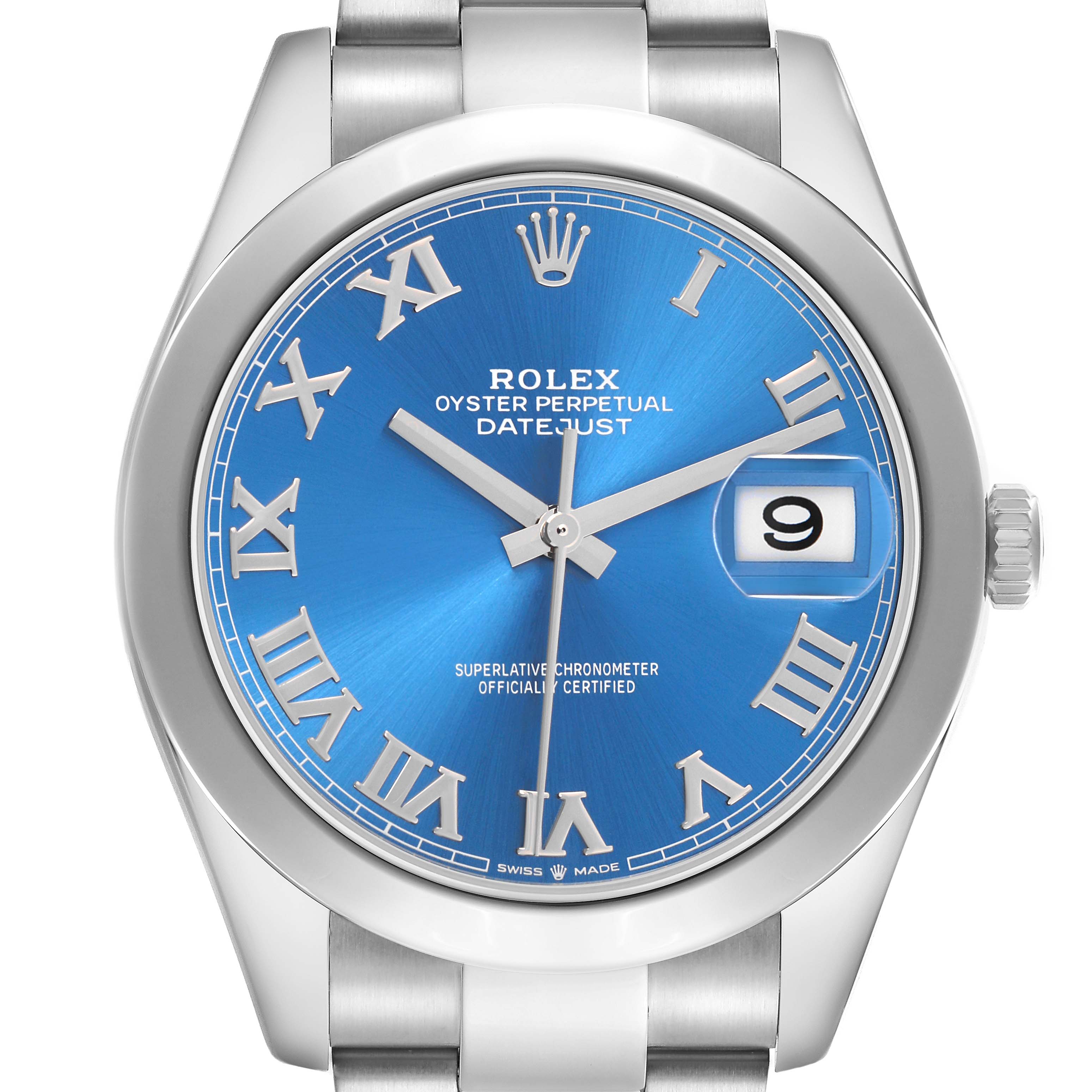 The Rolex Datejust 126300 Men
s Stainless Steel Blue Dial watch is shown from the front, highlighting the blue dial, Roman numerals, and date window.