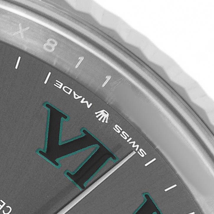 The image shows a close-up of the Rolex Datejust 41 126334 Men's Stainless Steel Grey Dial's dial, featuring the Roman numeral VI, minute markers, and "SWISS MADE" text.