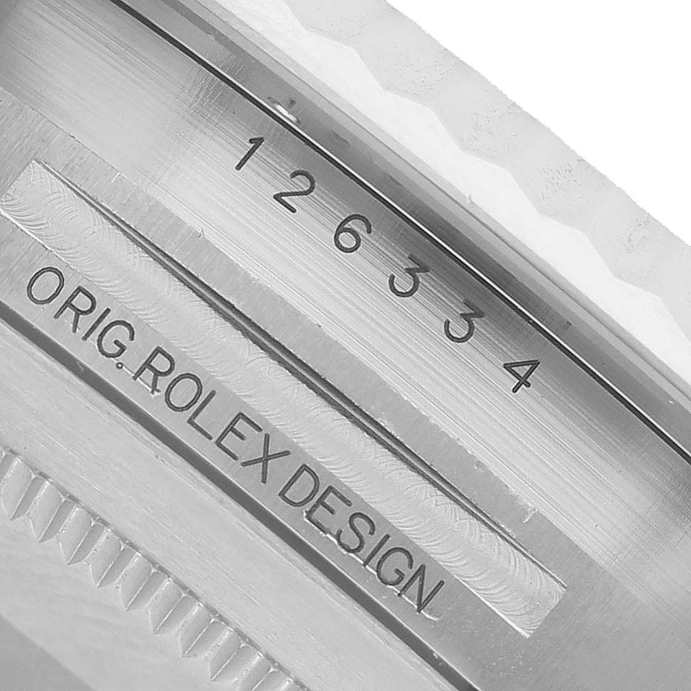 The image shows an engraved side view of the Rolex Datejust 41 126334 Men's Stainless Steel Grey Dial model's watch case with "ORIG. ROLEX DESIGN" and the number "126334."