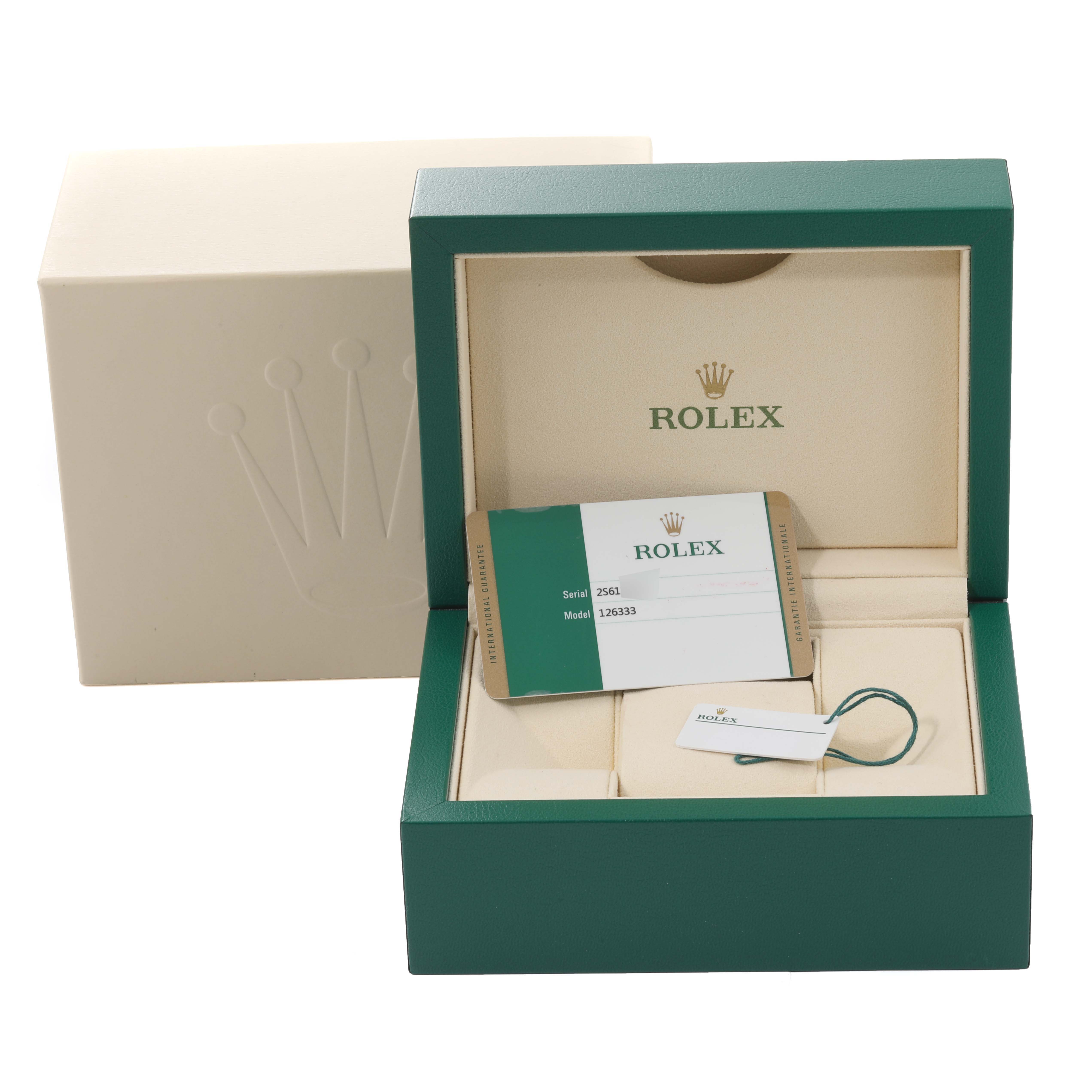 The image shows the packaging and accessories of a Rolex Datejust 41 126333 Men's Steel and Gold (two tone) Champagne Dial 126333 Men's Steel and Gold (two tone) Champagne Dial, including the box, warranty card, and tag.