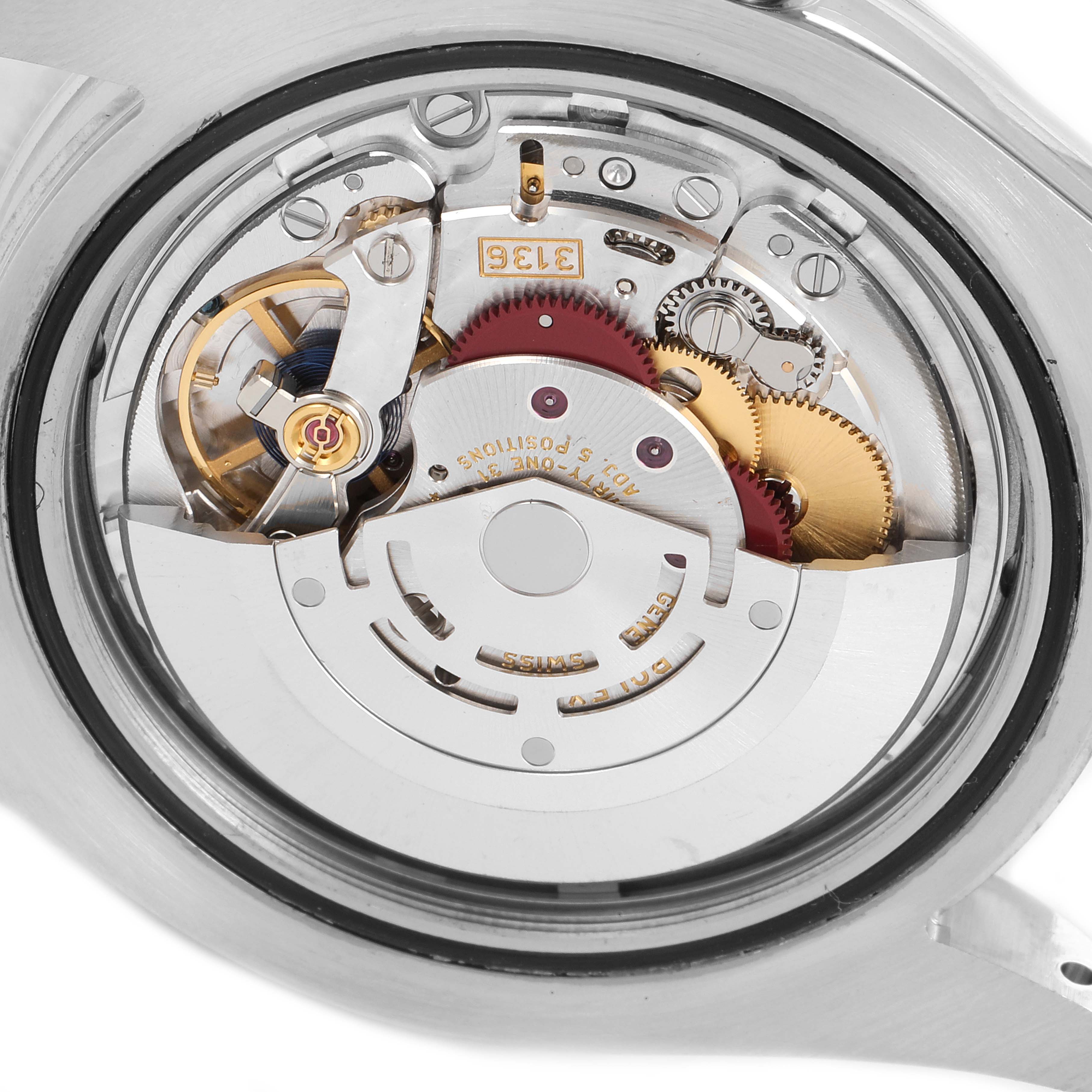 The image shows the internal mechanical movement of a Rolex Datejust 41 116300 Men
s Stainless Steel Blue Dial 116300 Men
s Stainless Steel Blue Dial watch from the back.