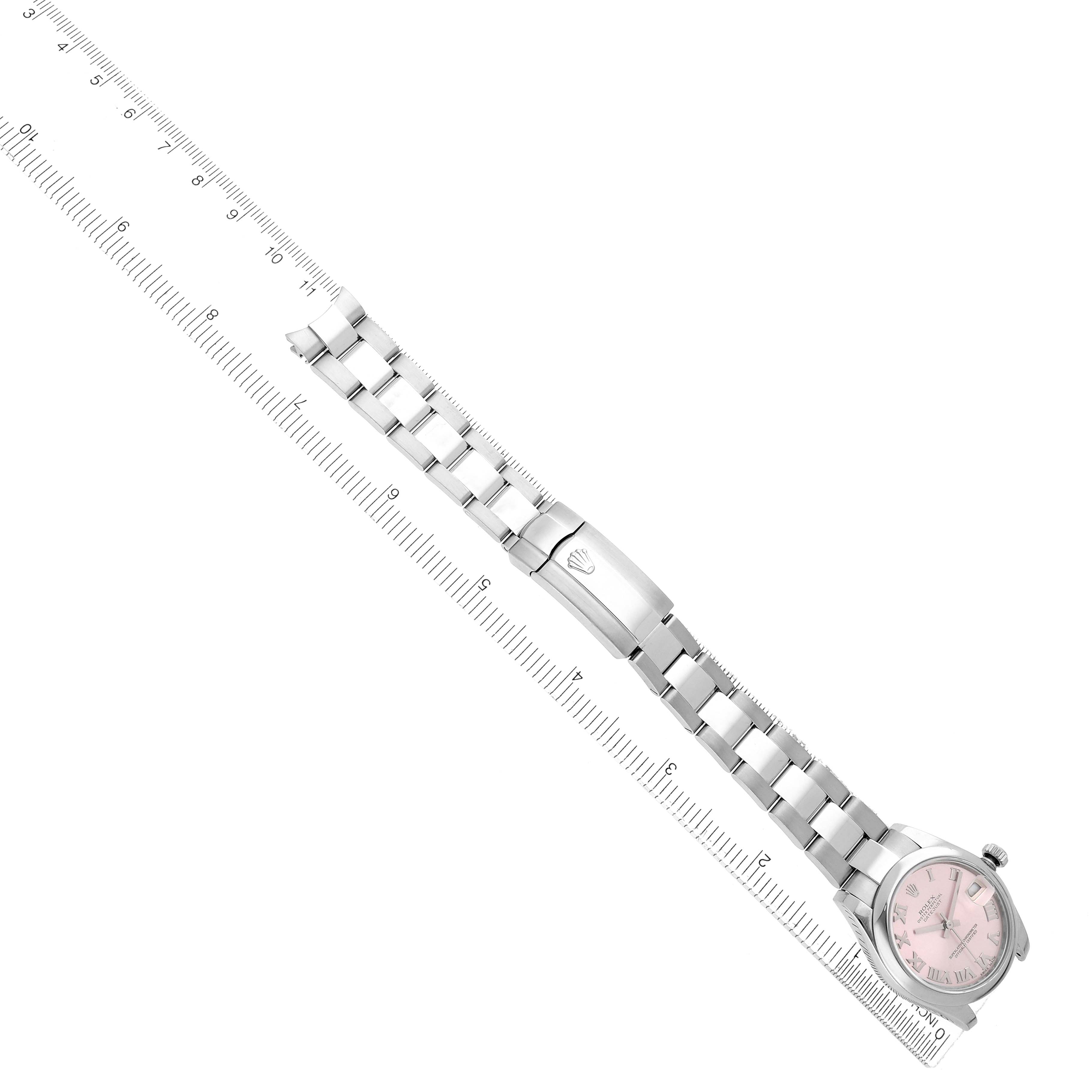 The image shows a Rolex Datejust 178240 Women
s Stainless Steel Pink Dial watch at an angle, highlighting the bracelet and clasp with a ruler for scale.
