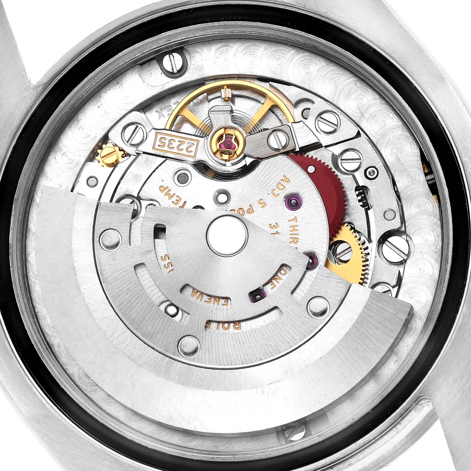 The image shows a close-up of the movement in a Rolex Datejust 178240 Women
s Stainless Steel Pink Dial, highlighting gears and rotor from the back.
