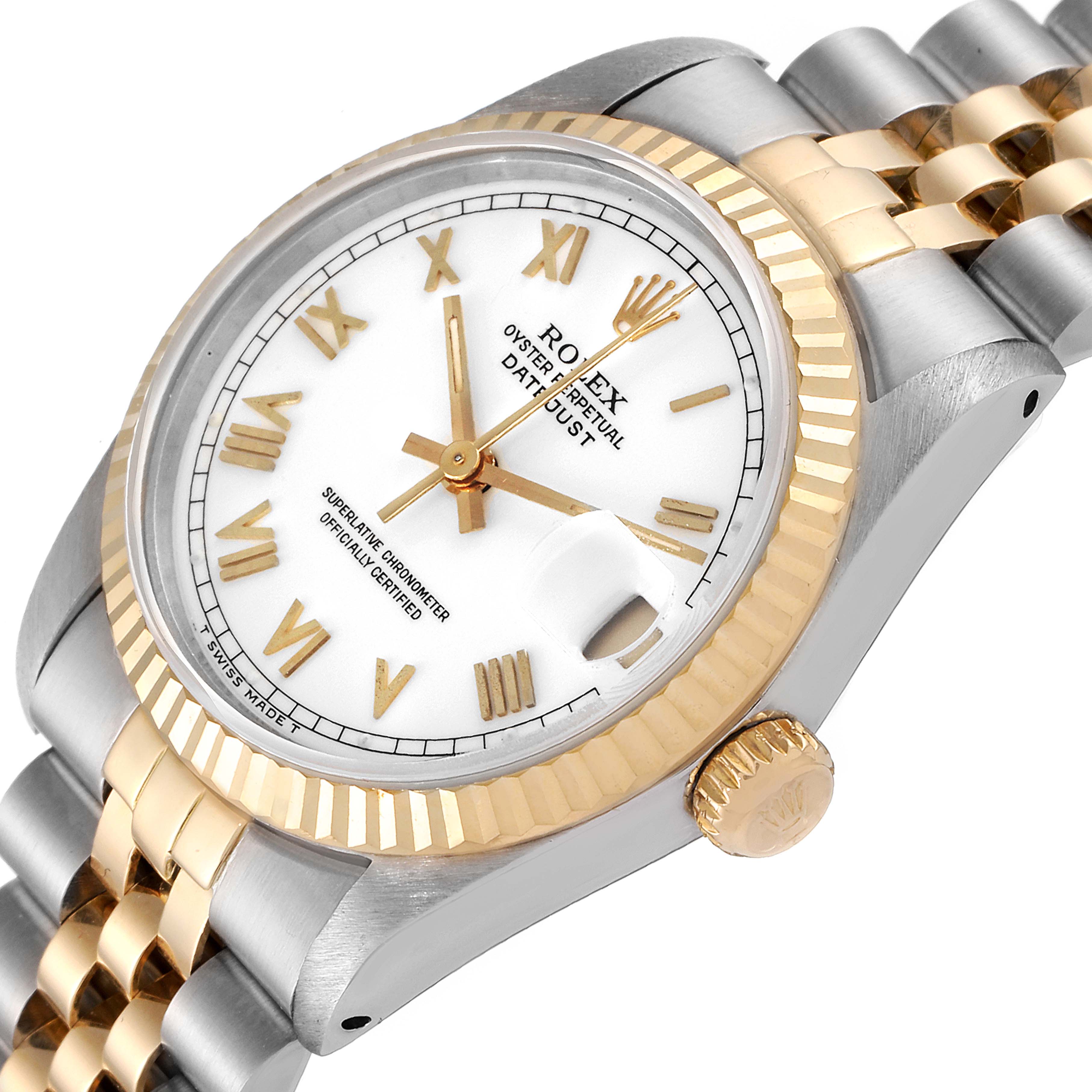 The image shows a Rolex Mid-Size 68273 Women
s Steel and Gold (two tone) White Dial 68273 Women
s Steel and Gold (two tone) White Dial Datejust watch angled to display the face, bezel, crown, and part of the bracelet.