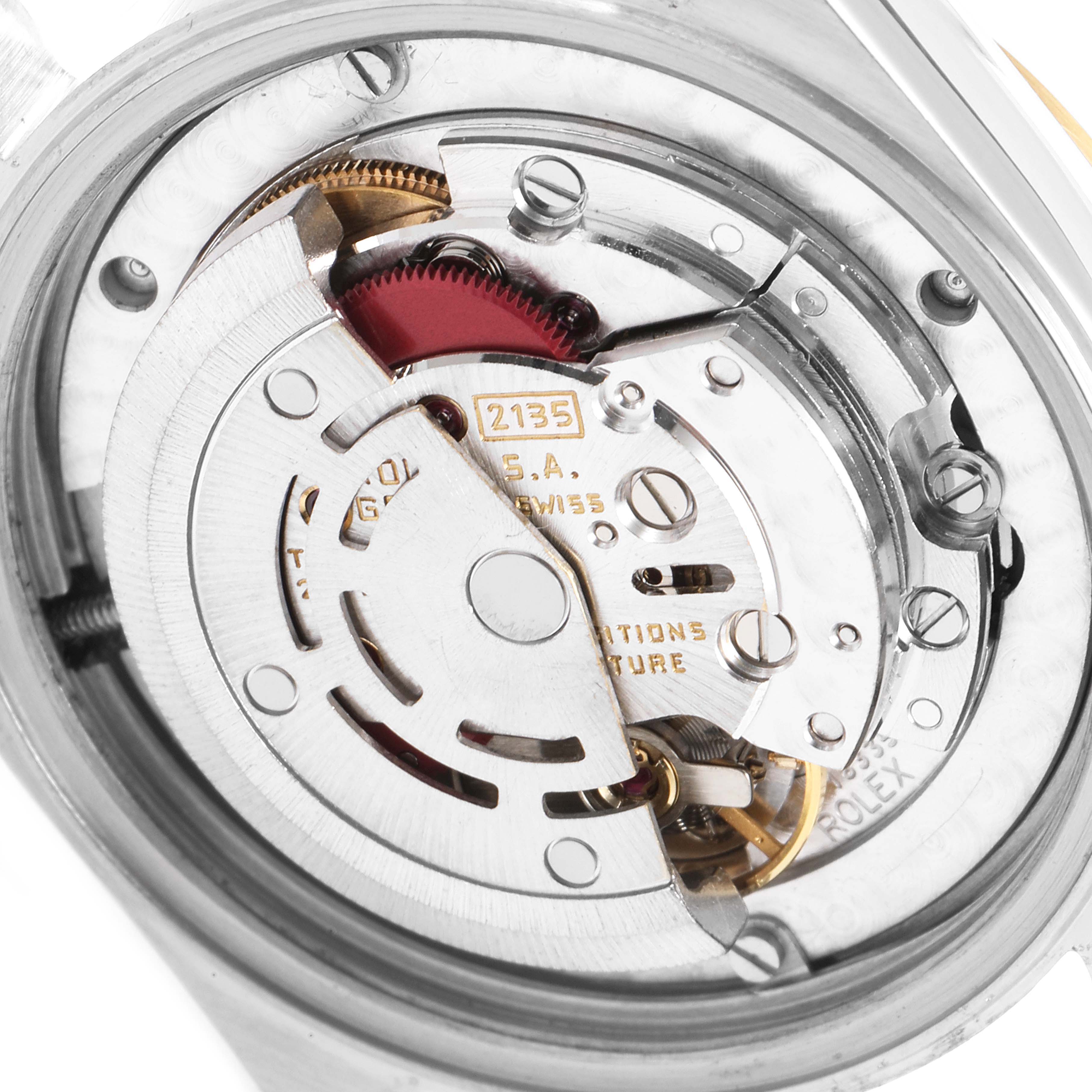 This image displays the internal mechanism of a Rolex Mid-Size 68273 Women
s Steel and Gold (two tone) White Dial 68273 Women
s Steel and Gold (two tone) White Dial model watch, focusing on its automatic movement parts.
