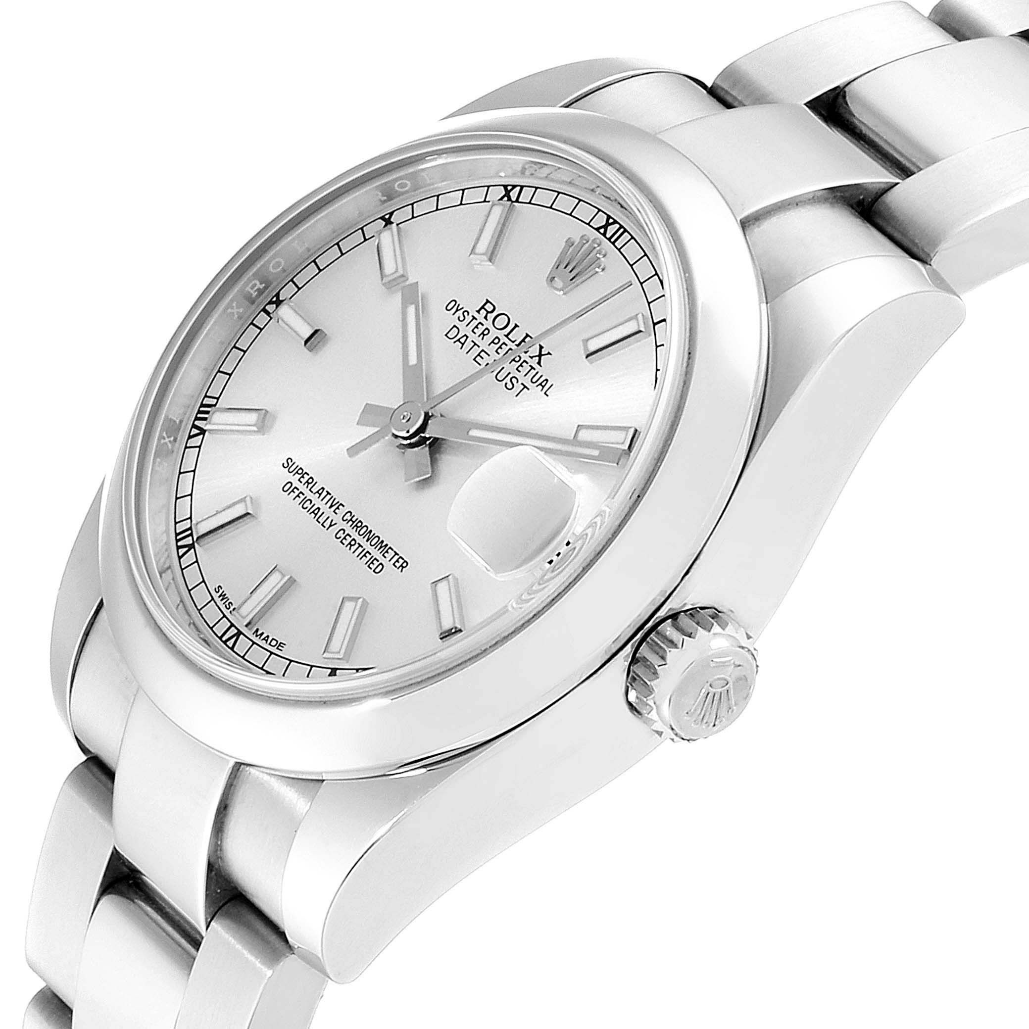 The image shows a Mid-Size Rolex watch from an angled side view, highlighting the face, crown, and part of the bracelet.