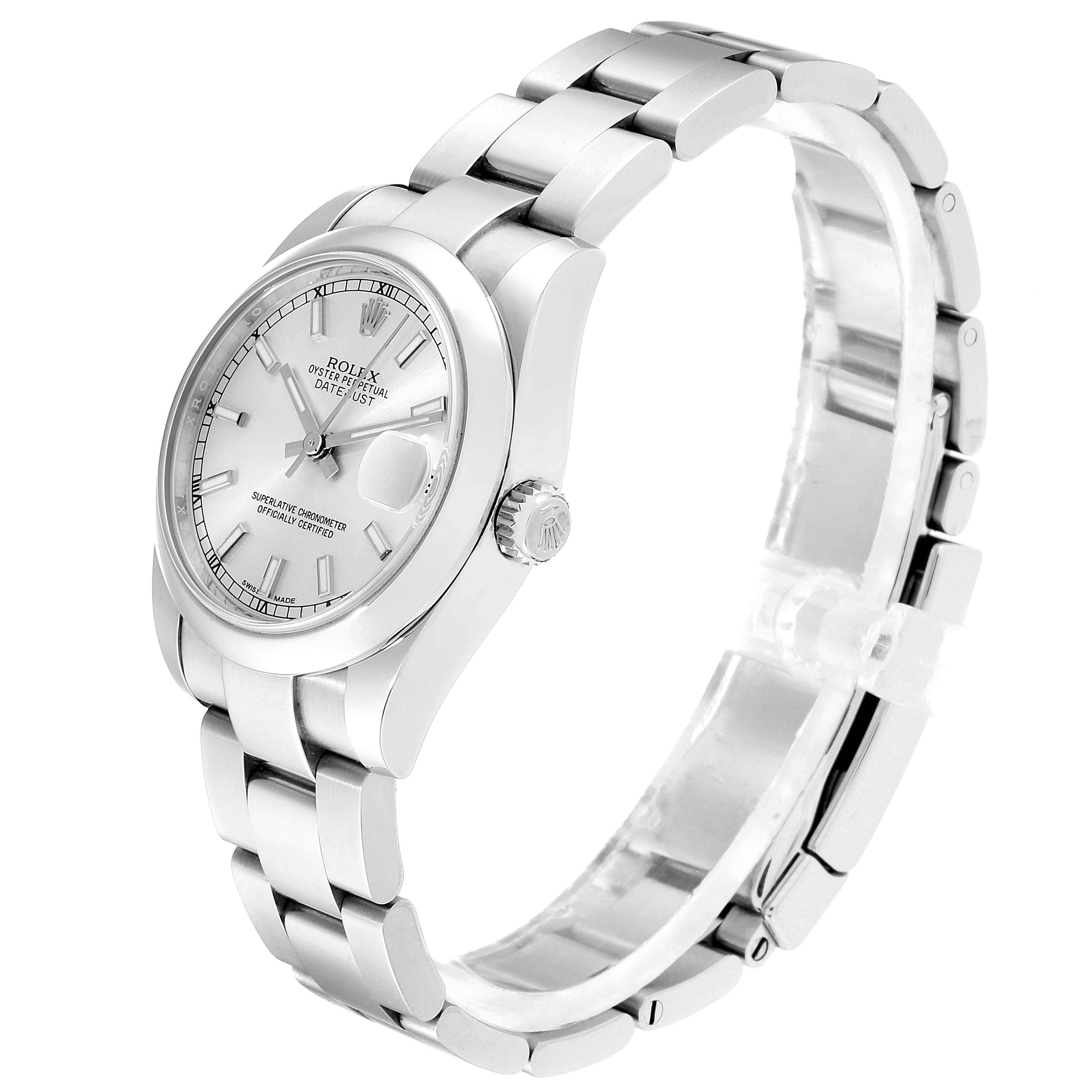 The image shows a side view of a mid-size Rolex Datejust watch, highlighting the dial, crown, and part of the bracelet.