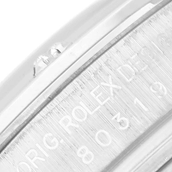 This is a close-up image of the engraved inner bezel of a Rolex Pearlmaster 80319 Women's White Gold Silver Dial 80319 Women's White Gold Silver Dial watch.