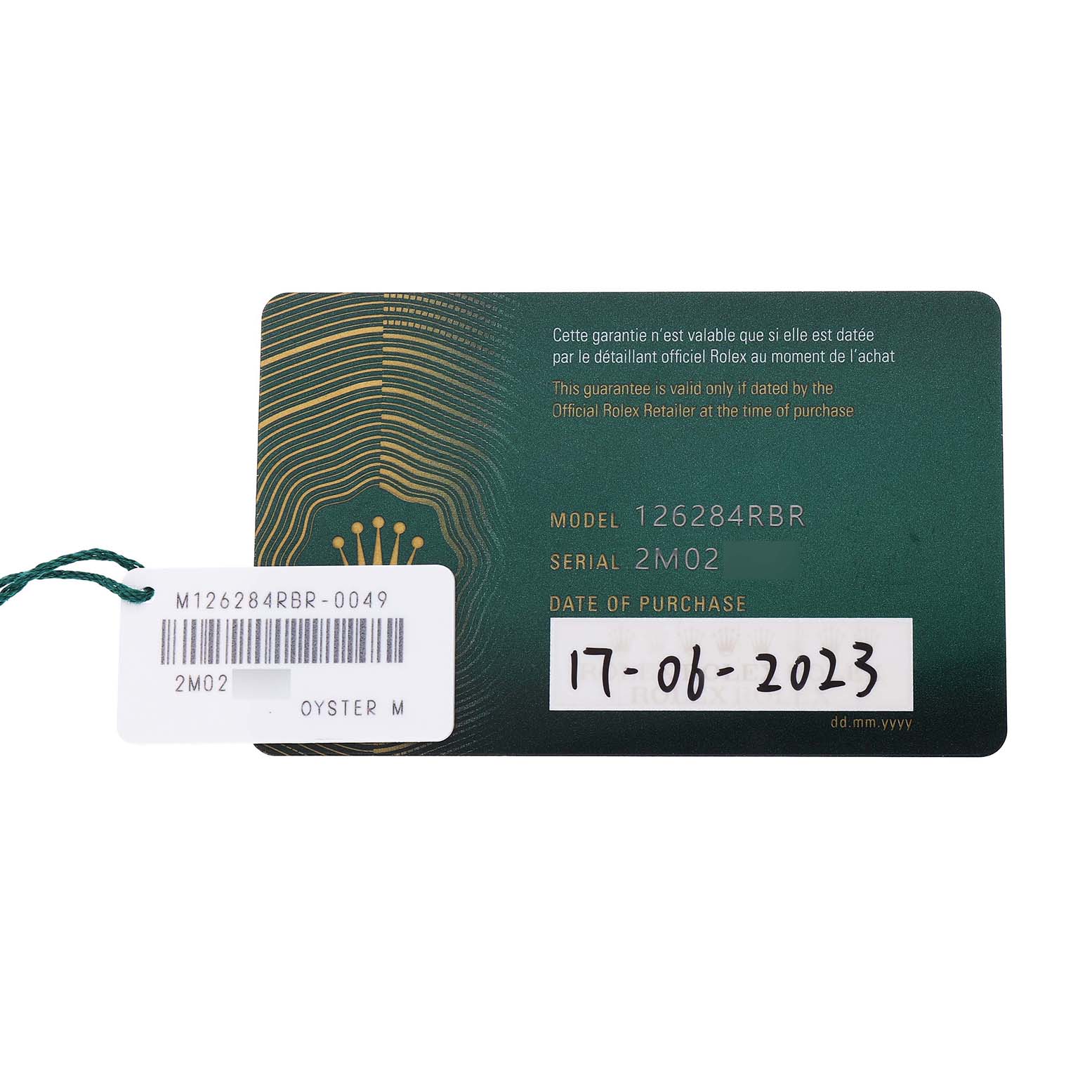 The image shows a Rolex Datejust 126284 Men's Stainless Steel Blue Dial warranty card with model and serial numbers, alongside a labeled tag.
