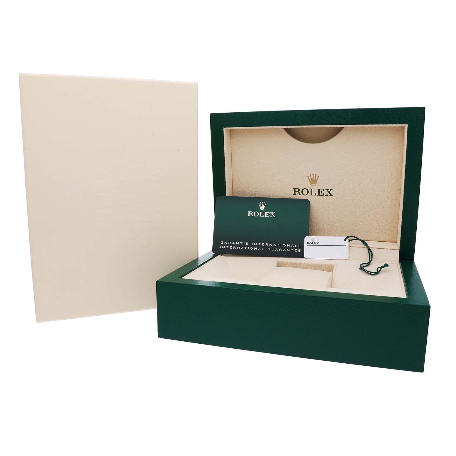 The image shows an open Rolex Datejust 126284 Men's Stainless Steel Blue Dial box with its warranty card and tag displayed from a front angle.